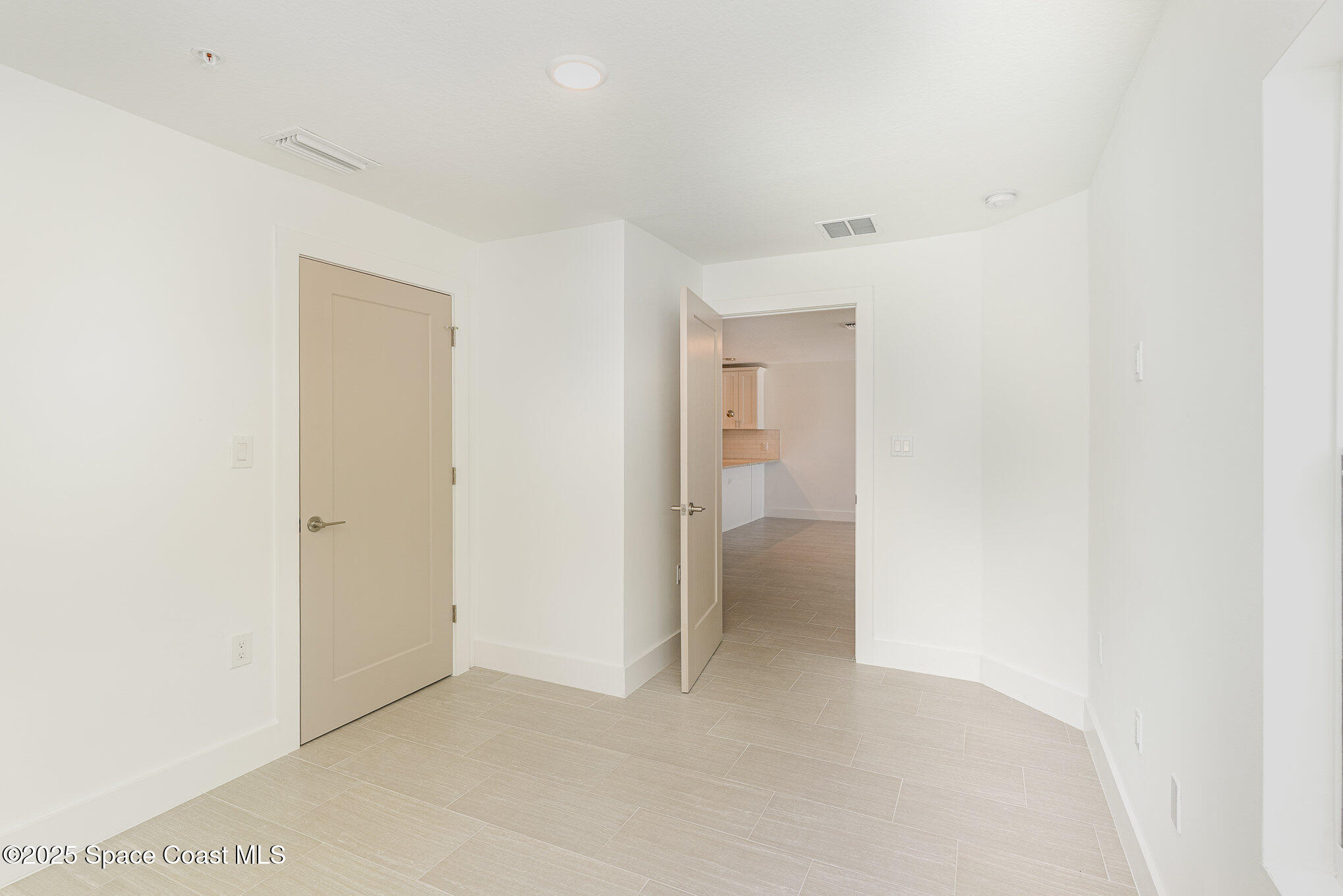 1635 Par Street Northeast, Unit 2202 Palm Bay, FL 32905 - Photo 15 of 45 a view of a room with a hallway