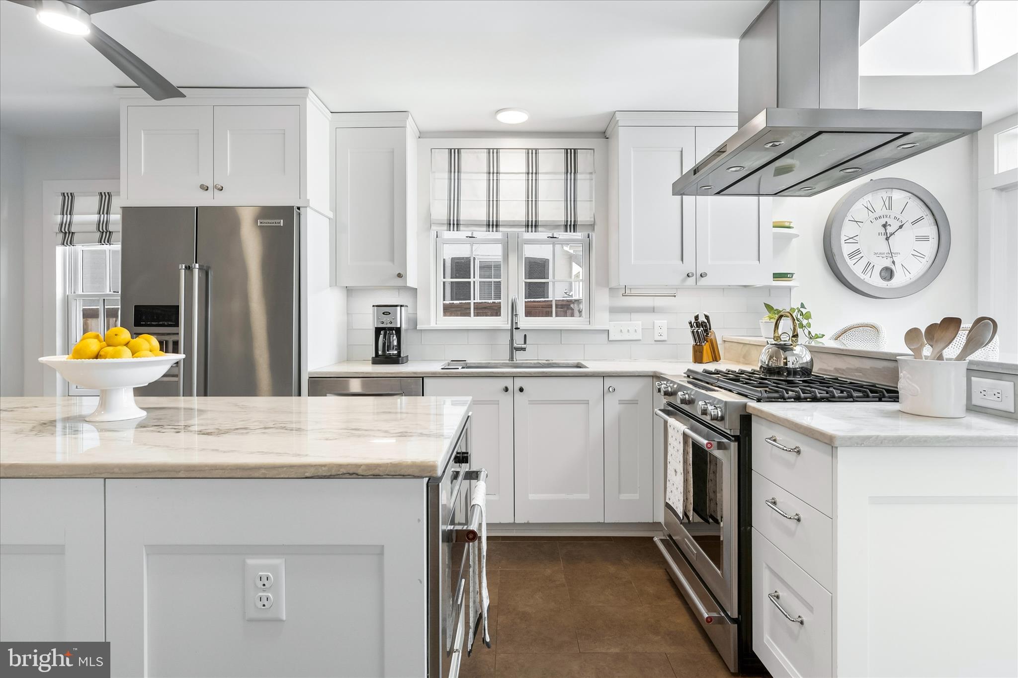 225 East 2nd Street Frederick, MD 21701 - Photo 24 of 125 a kitchen with stainless steel appliances granite countertop a sink a stove and a refrigerator