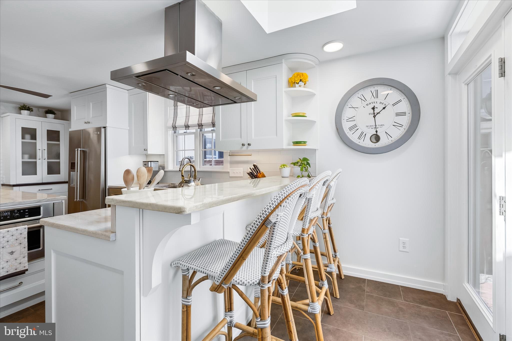 225 East 2nd Street Frederick, MD 21701 - Photo 27 of 125 Enjoy a cup of coffee at the elevated countertop.