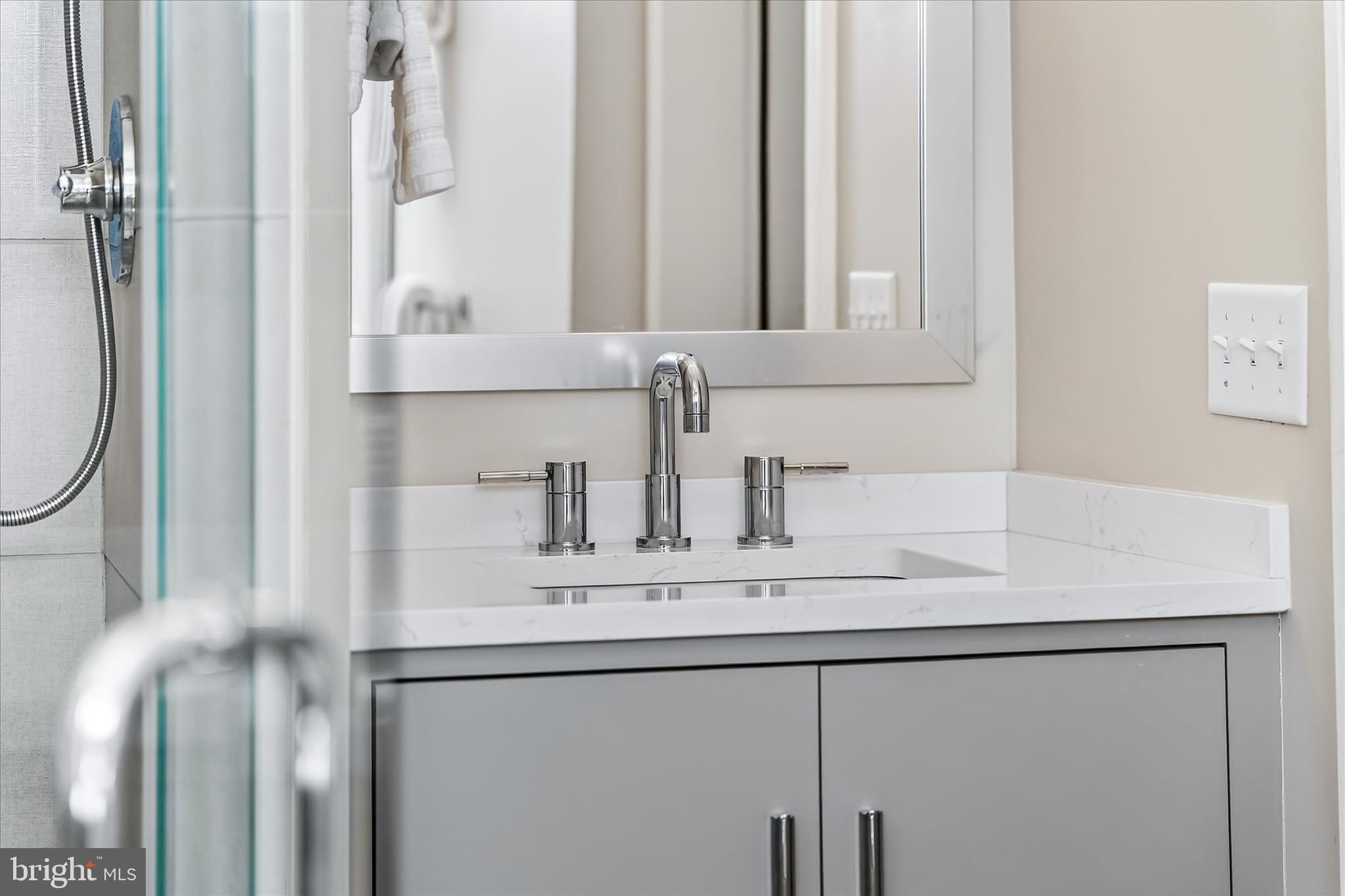 225 East 2nd Street Frederick, MD 21701 - Photo 43 of 125 a bathroom with a sink and a mirror