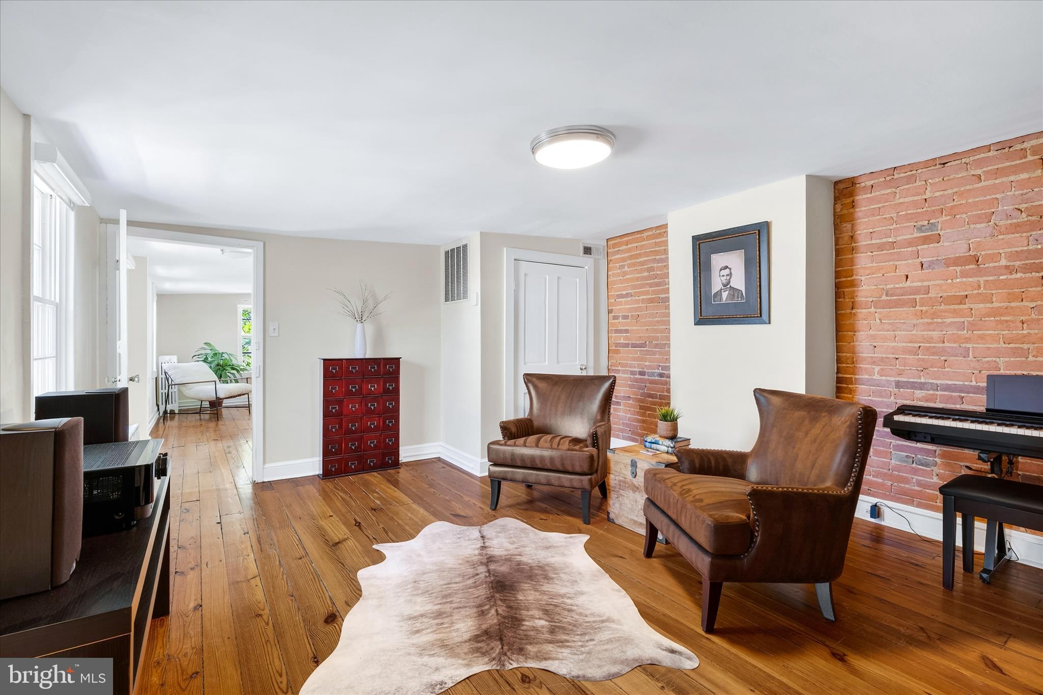 225 East 2nd Street Frederick, MD 21701 - Photo 56 of 125 a living room with furniture wooden floor and a window