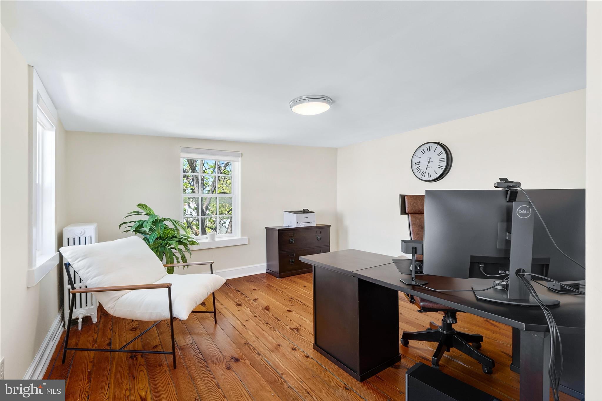 225 East 2nd Street Frederick, MD 21701 - Photo 59 of 125 a view of a workspace with furniture and a window