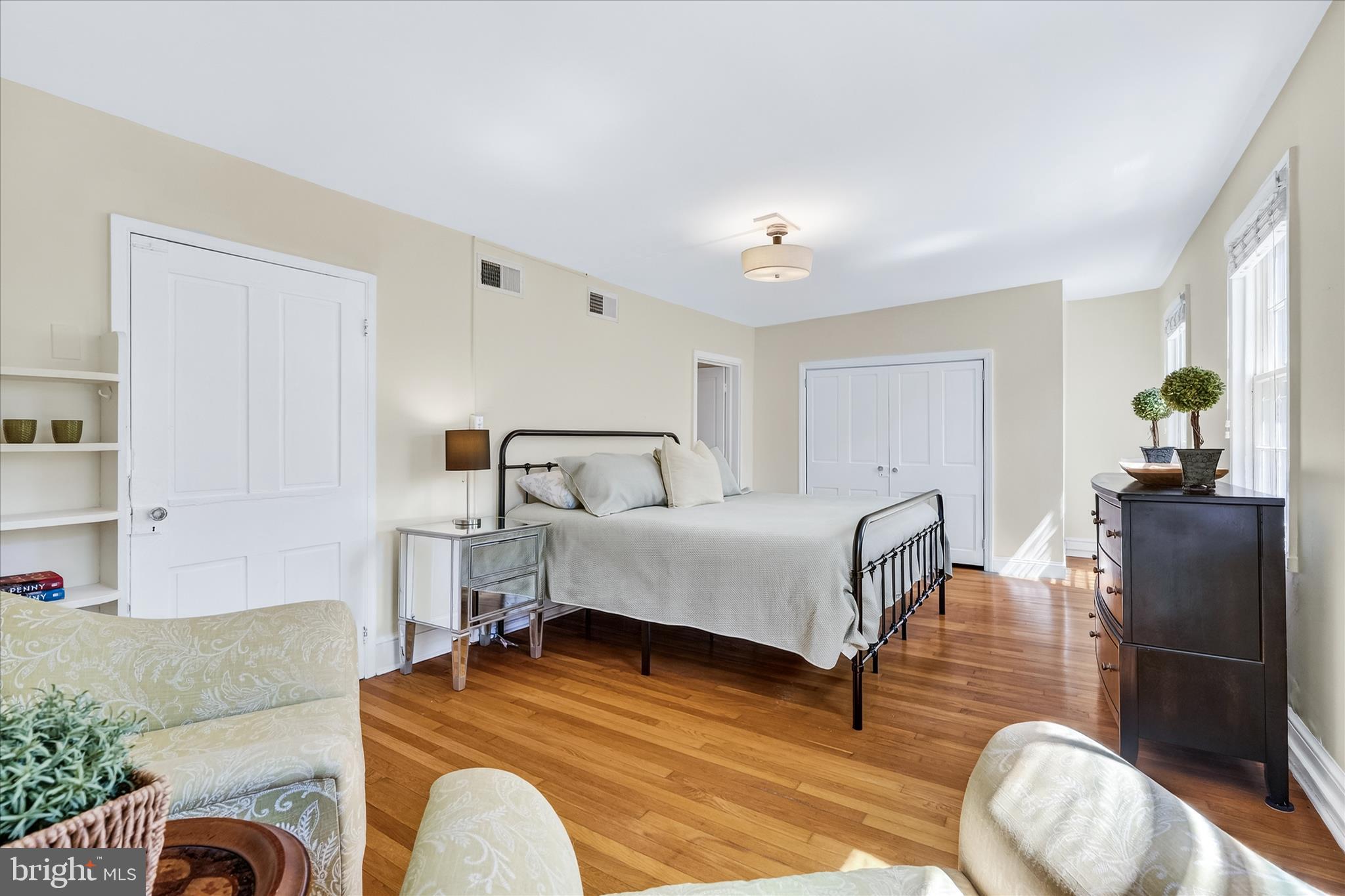 225 East 2nd Street Frederick, MD 21701 - Photo 65 of 125 a bedroom with a bed and wooden floor