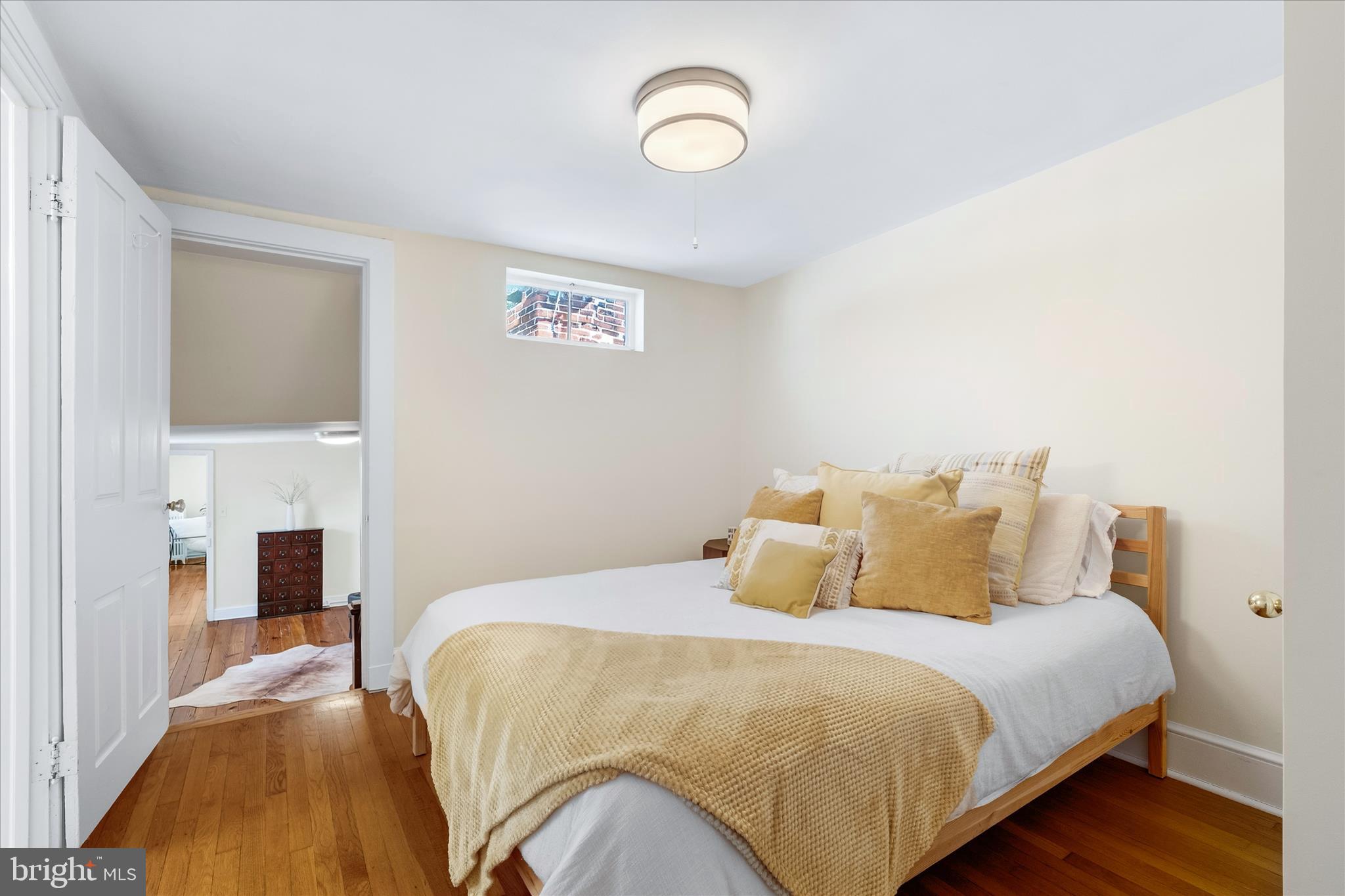 225 East 2nd Street Frederick, MD 21701 - Photo 67 of 125 a bedroom with a bed and a fireplace