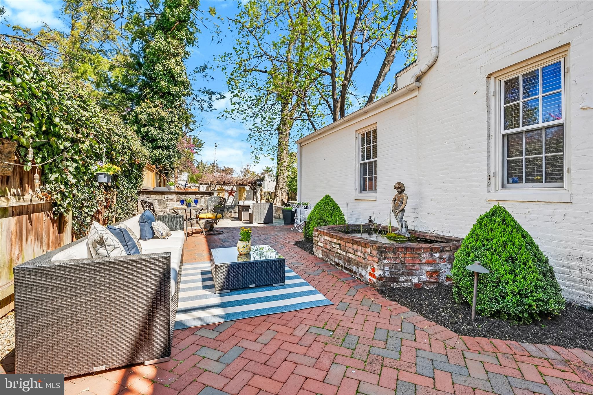 225 East 2nd Street Frederick, MD 21701 - Photo 71 of 125 a view of a patio with couches and potted plants
