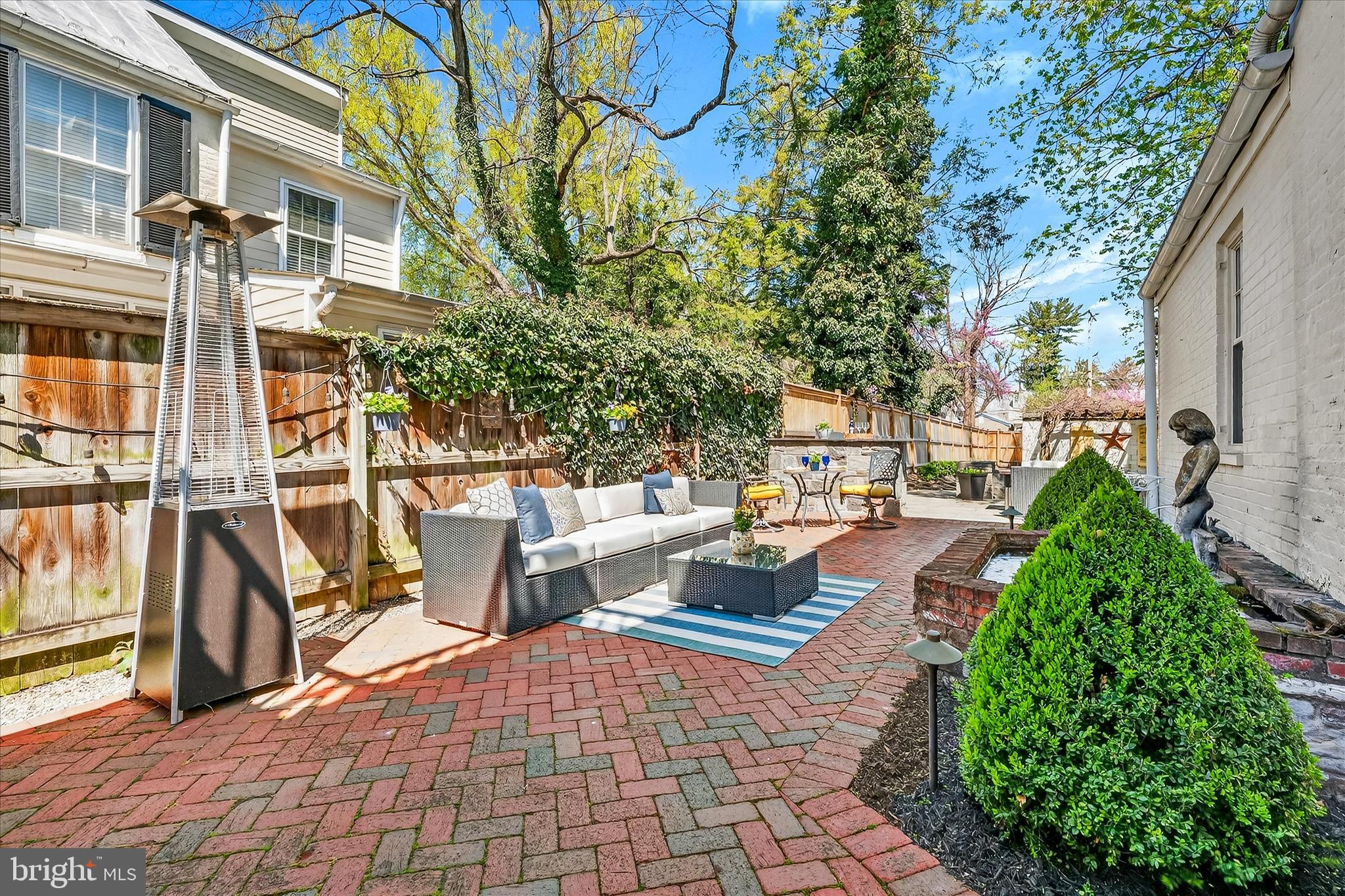 225 East 2nd Street Frederick, MD 21701 - Photo 72 of 125 a view of a patio with table and chairs and potted plants