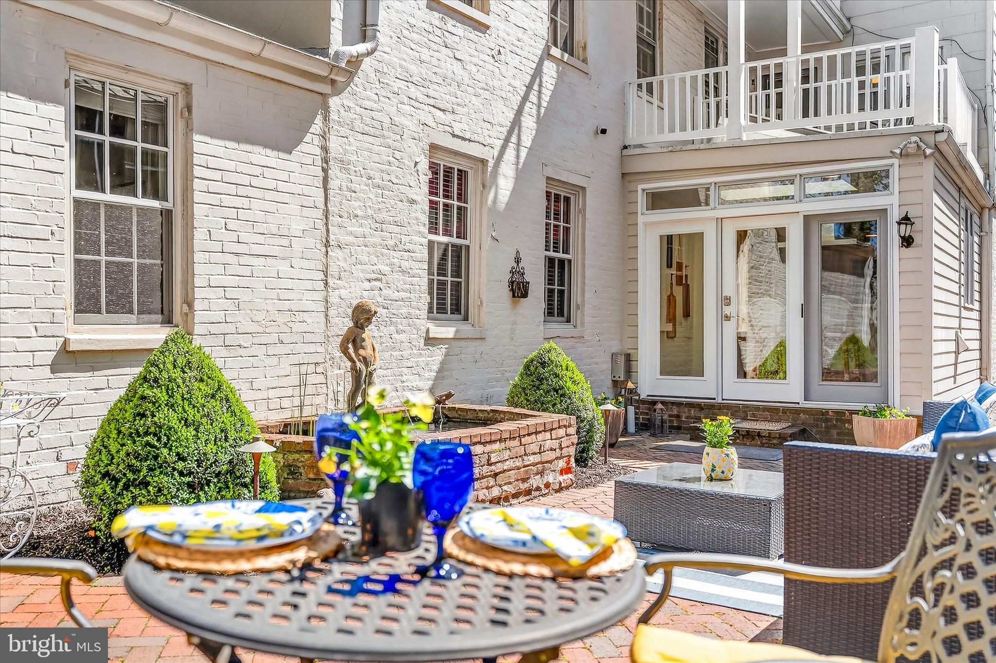 225 East 2nd Street Frederick, MD 21701 - Photo 74 of 125 a view of a patio with a table and chairs
