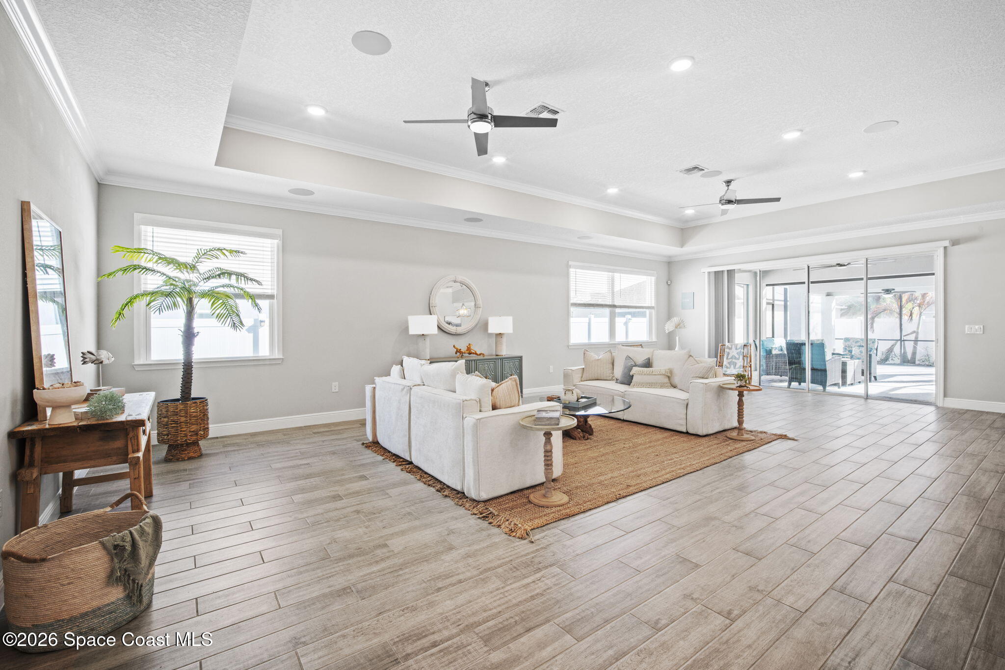 4835 Hebron Drive Merritt Island, FL 32953 - Photo 19 of 53 a living room with furniture and a wooden floor