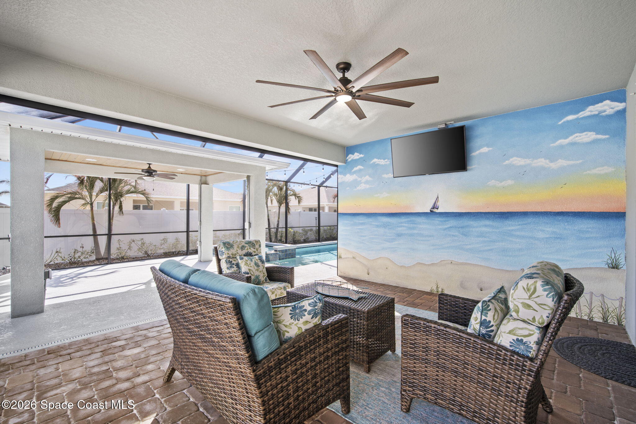 4835 Hebron Drive Merritt Island, FL 32953 - Photo 27 of 53 a living room with furniture and a large window