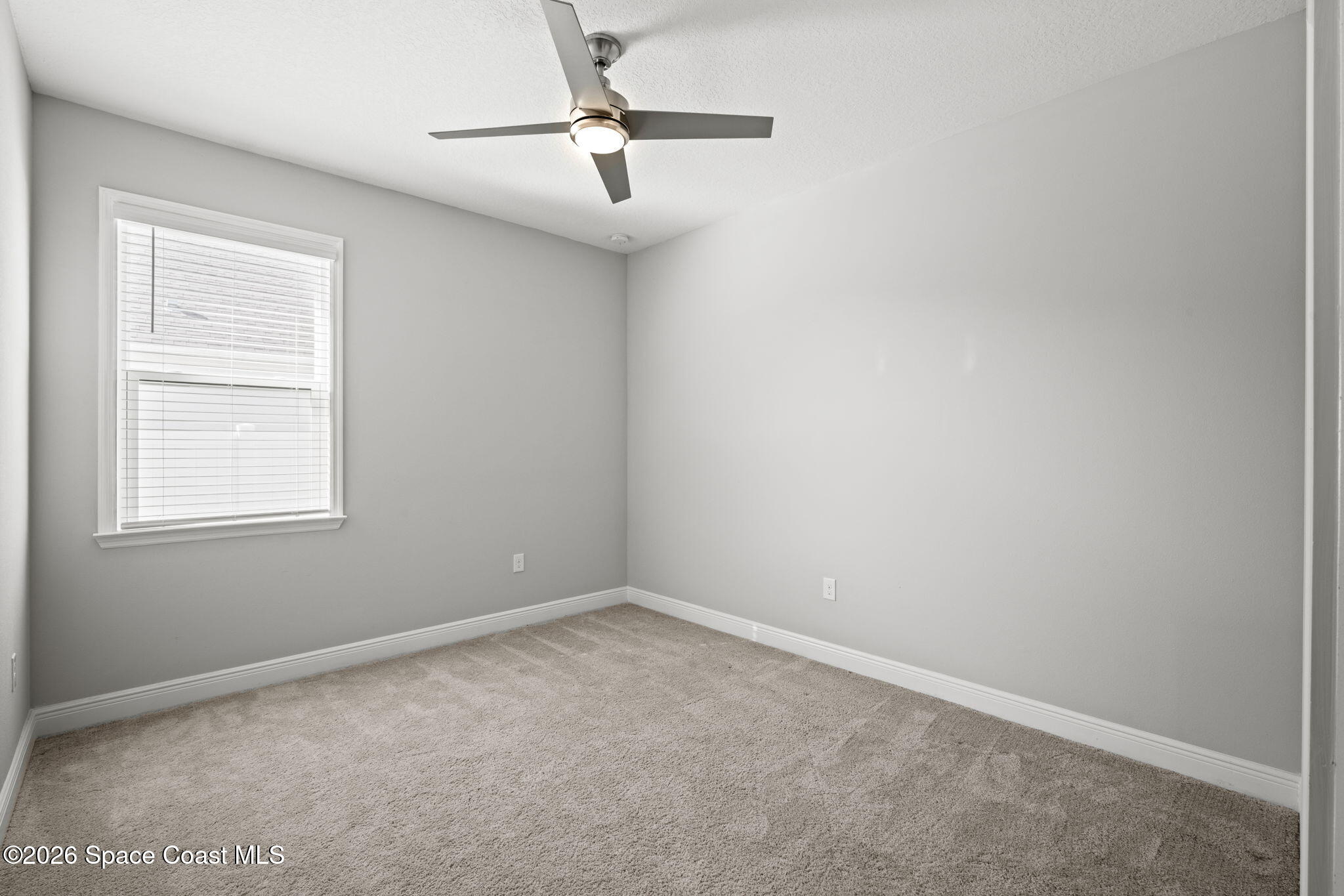 4835 Hebron Drive Merritt Island, FL 32953 - Photo 42 of 53 an empty room with a window