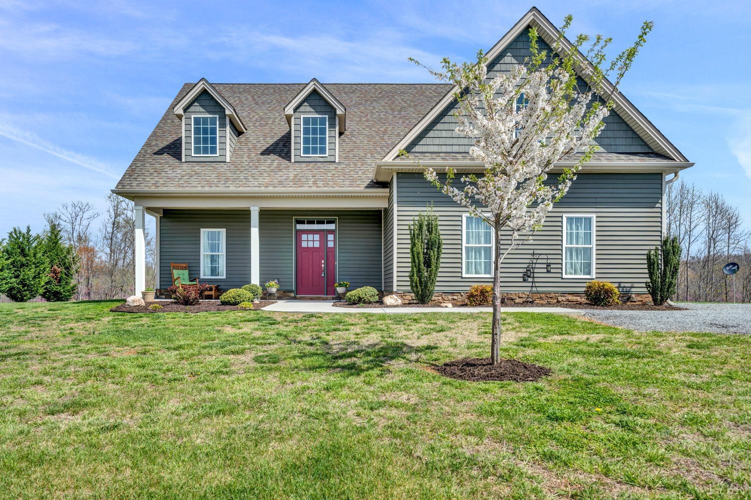 1333 Lynbrook Road Rustburg, VA 24588 - Photo 1 of 53 a front view of a house with garden