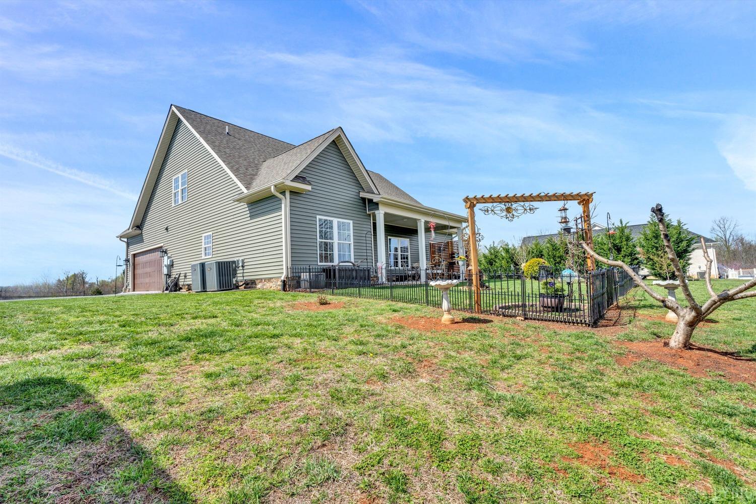 1333 Lynbrook Road Rustburg, VA 24588 - Photo 47 of 53 a view of a house with backyard and sitting area
