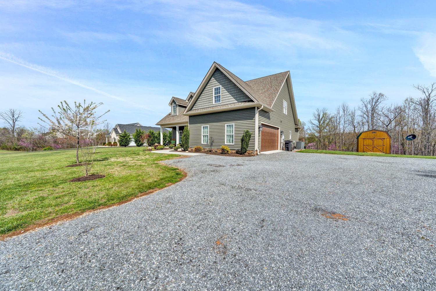 1333 Lynbrook Road Rustburg, VA 24588 - Photo 51 of 53 a house view with a garden space