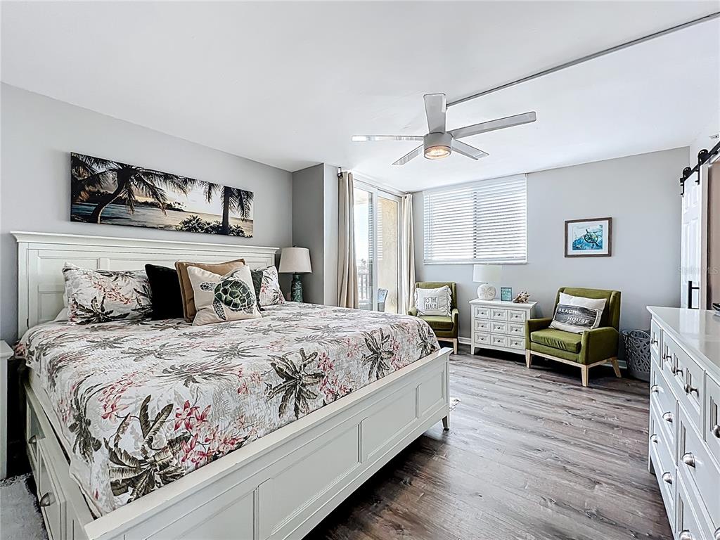 14146 Gulf Boulevard, Unit 3A Madeira Beach, FL 33708 - Photo 14 of 29 a bedroom with double bed and a window