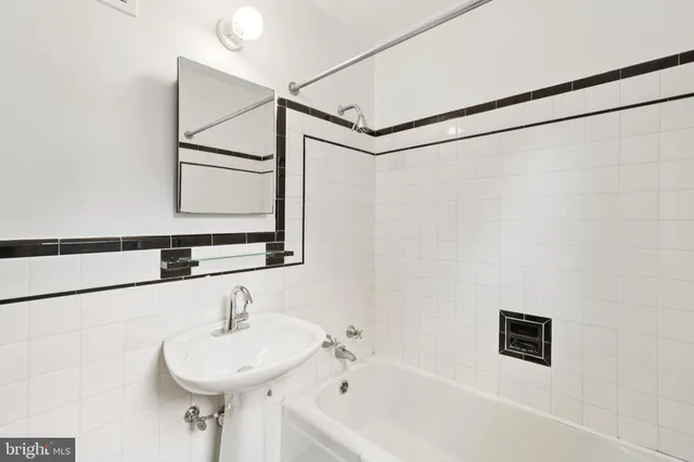 a bathroom with a sink and a bathtub