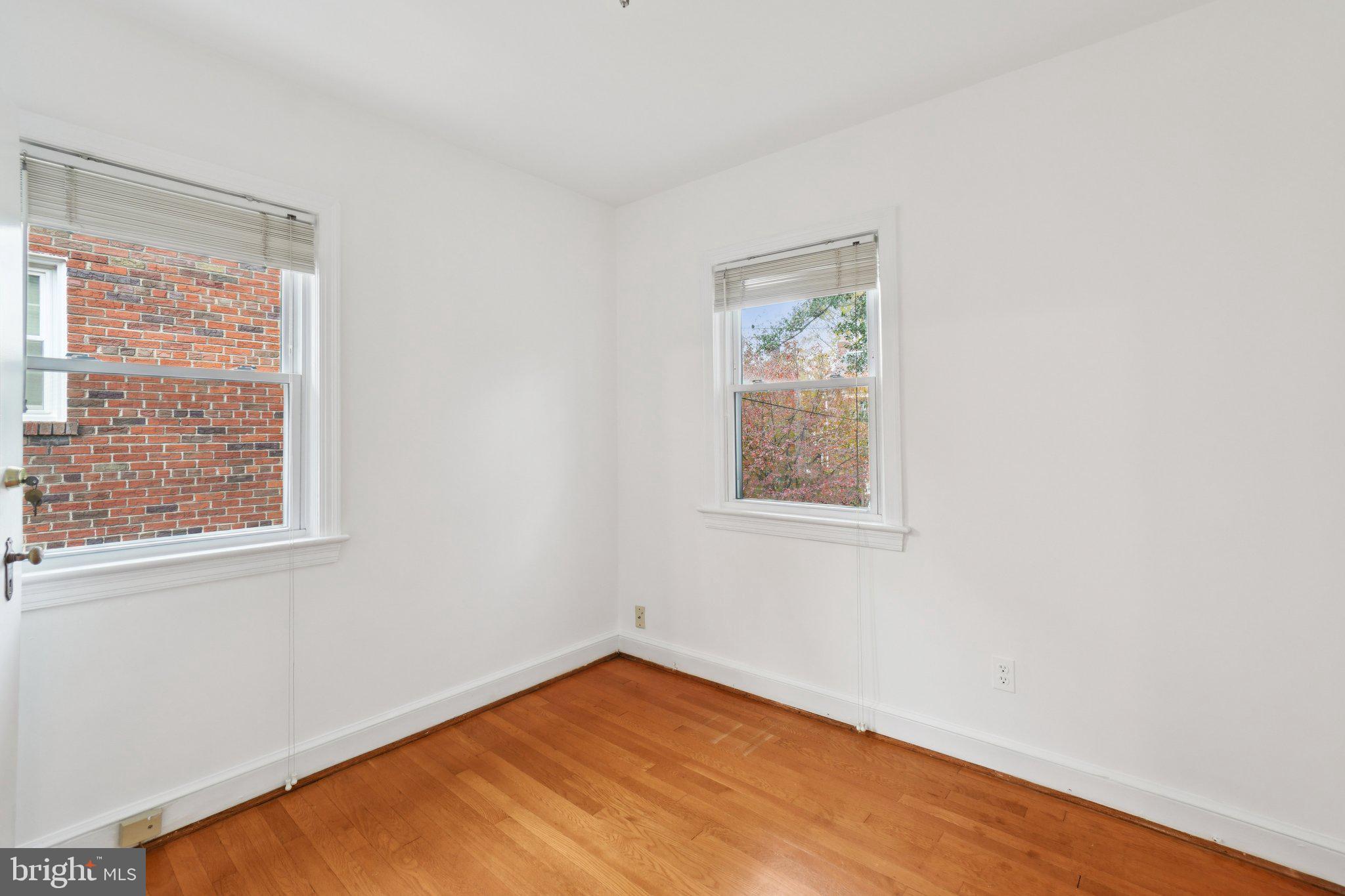 5008 44th Street Northwest Washington, DC 20016 - Photo 15 of 26 an empty room with a window