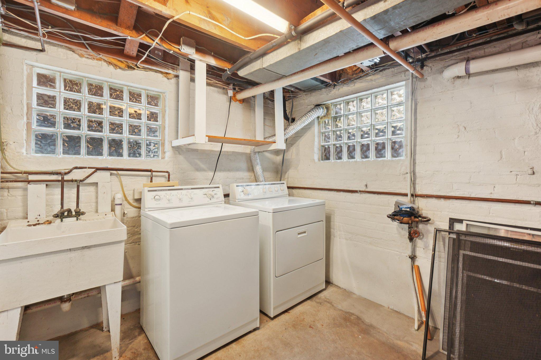 5008 44th Street Northwest Washington, DC 20016 - Photo 21 of 26 a utility room with dryer and washer