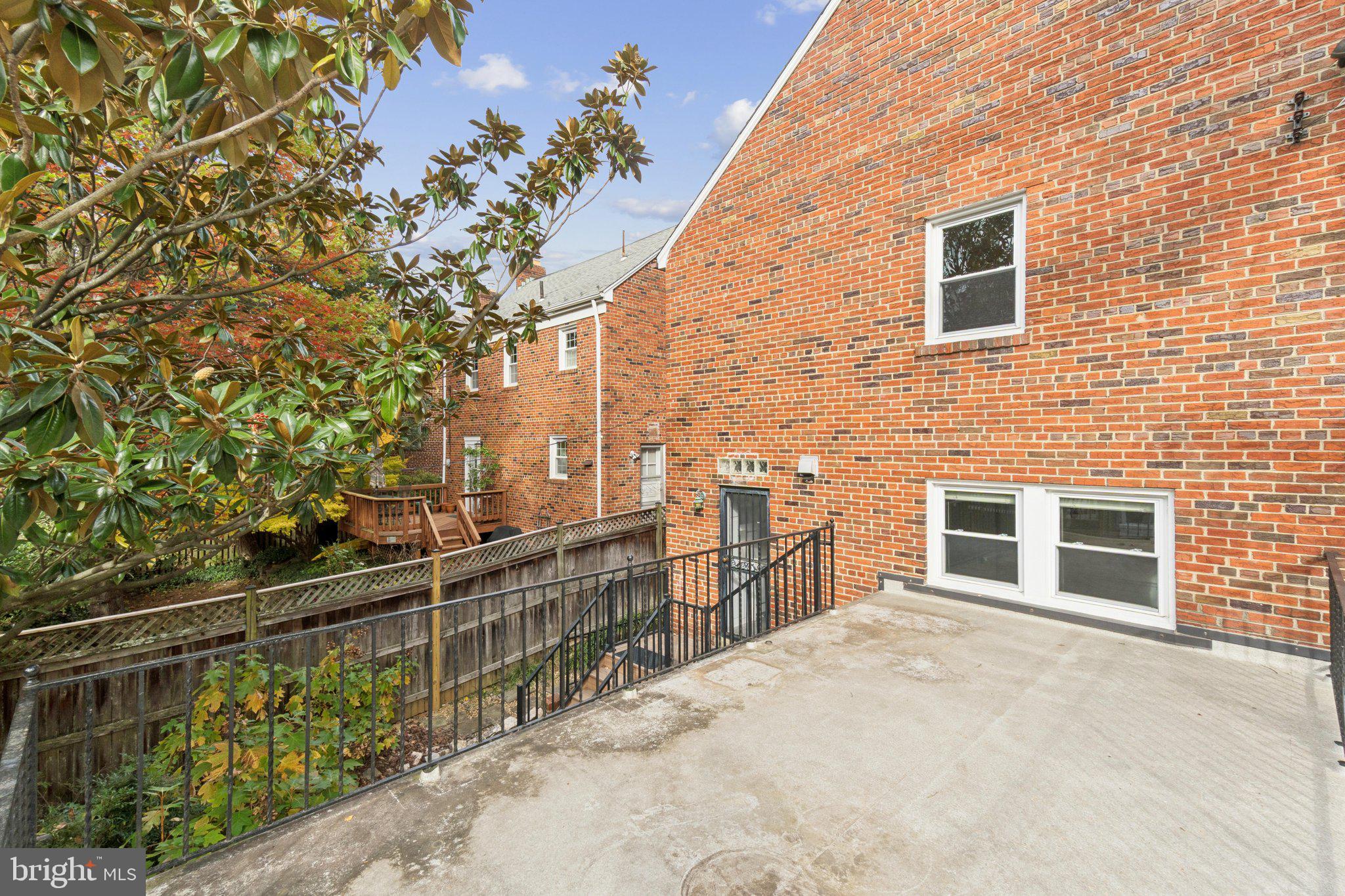 5008 44th Street Northwest Washington, DC 20016 - Photo 23 of 26 a view of a house with a backyard
