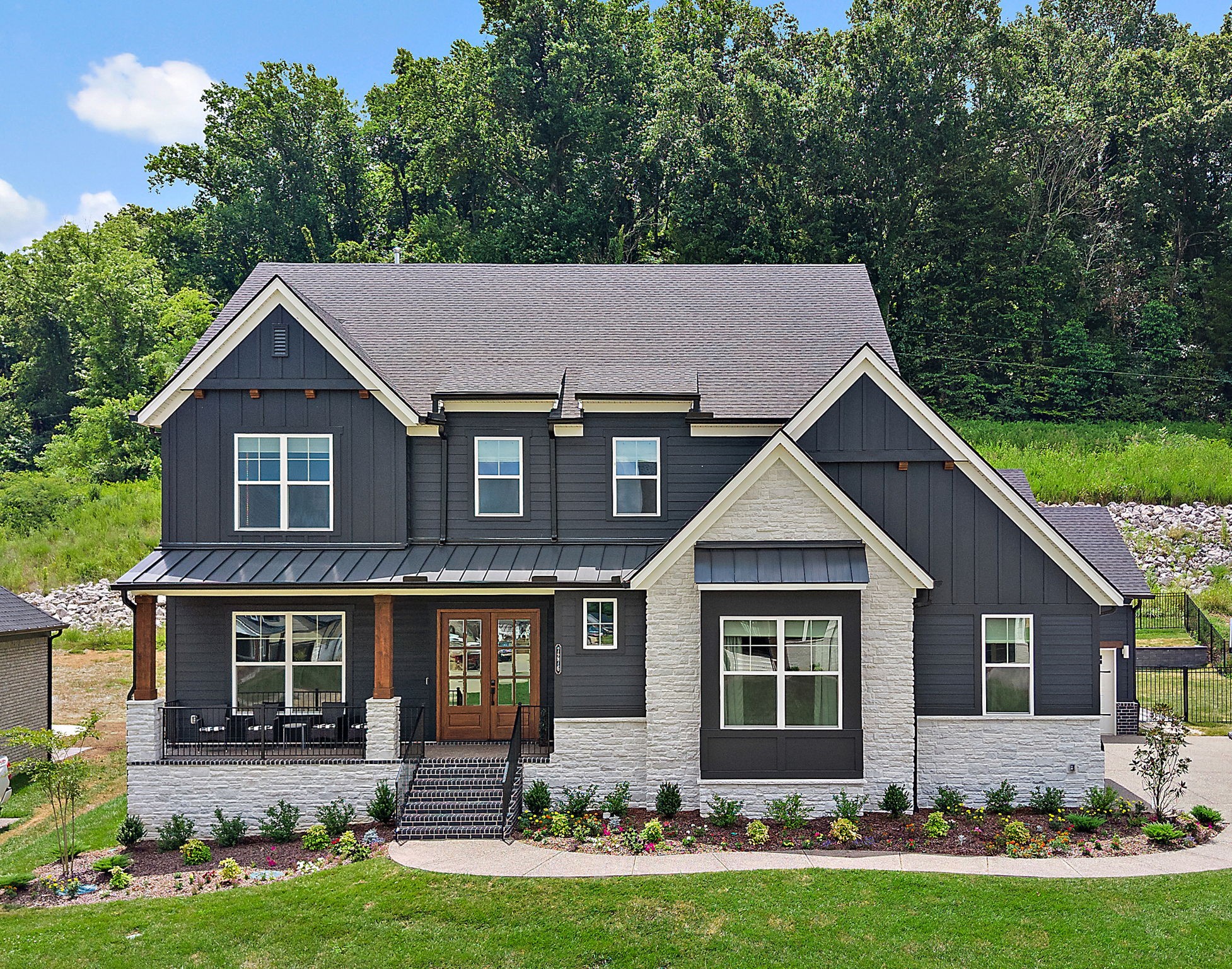 7276 Murrel Drive Franklin, TN 37064 - Photo 1 of 62 front view of a house with a yard