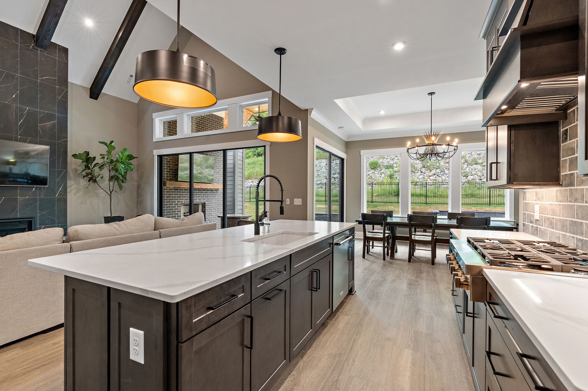 7276 Murrel Drive Franklin, TN 37064 - Photo 15 of 62 a kitchen that has a lot of cabinets a sink and a stove in it