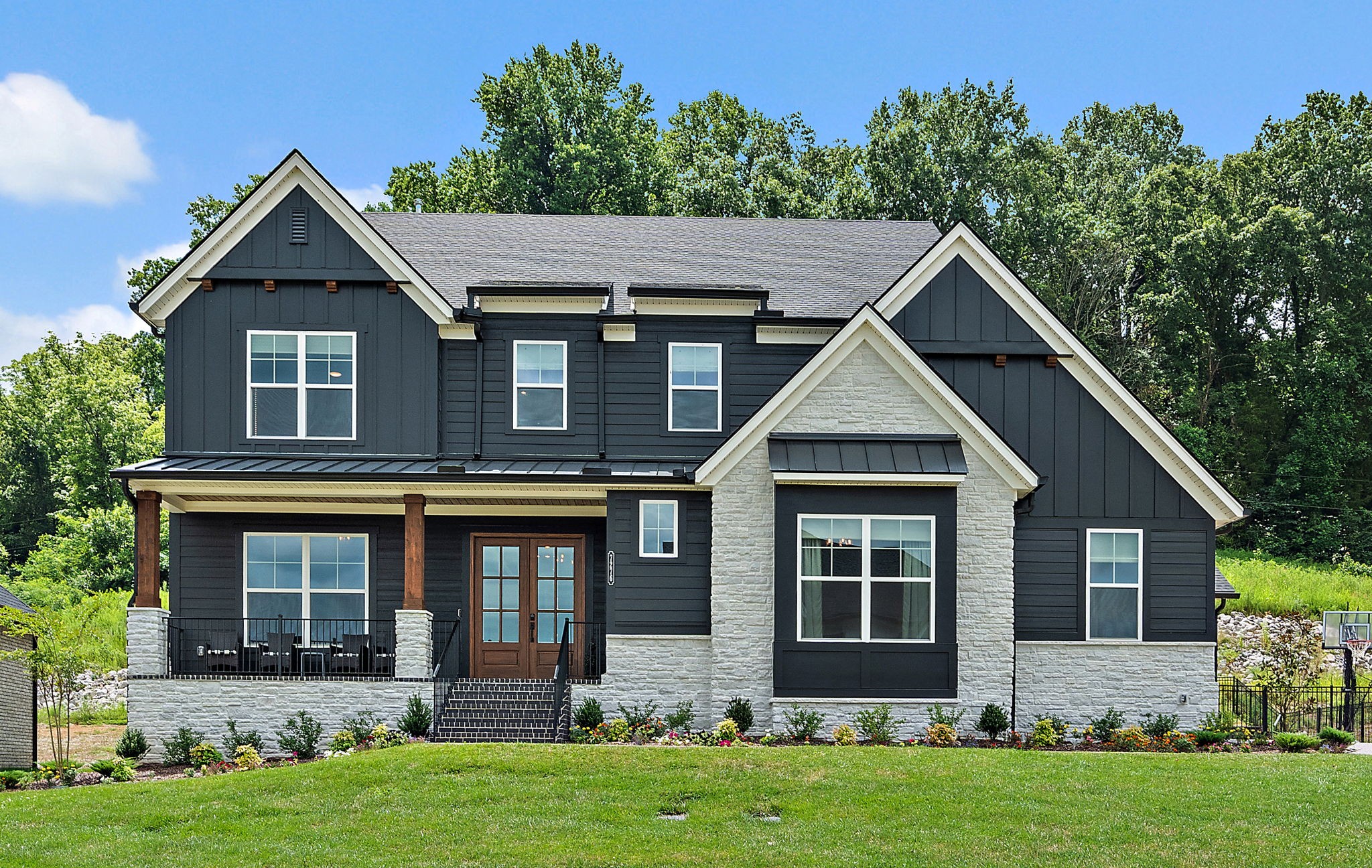 7276 Murrel Drive Franklin, TN 37064 - Photo 2 of 62 front view of a house with a yard