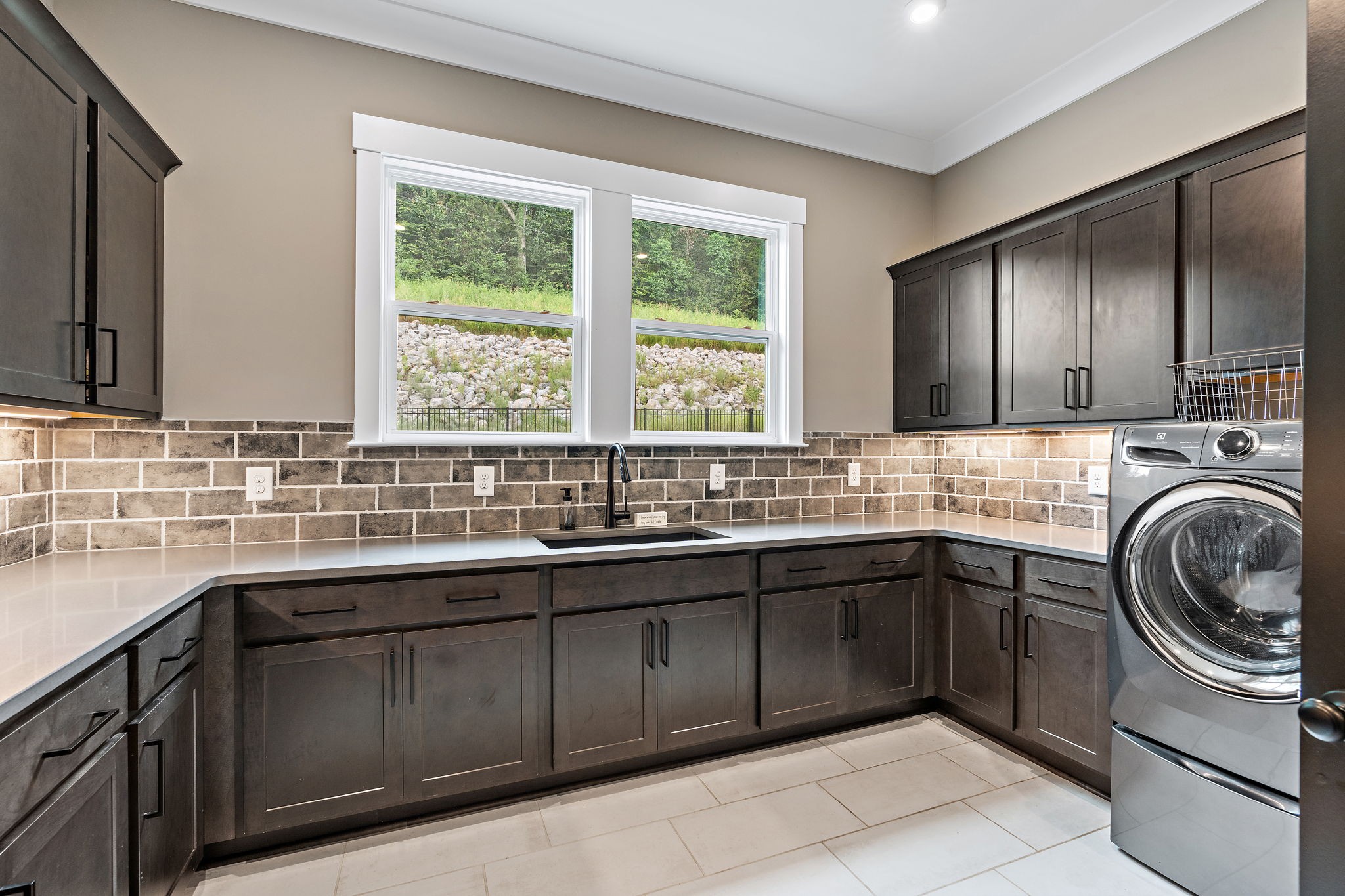 7276 Murrel Drive Franklin, TN 37064 - Photo 22 of 62 a kitchen with sink cabinets and window