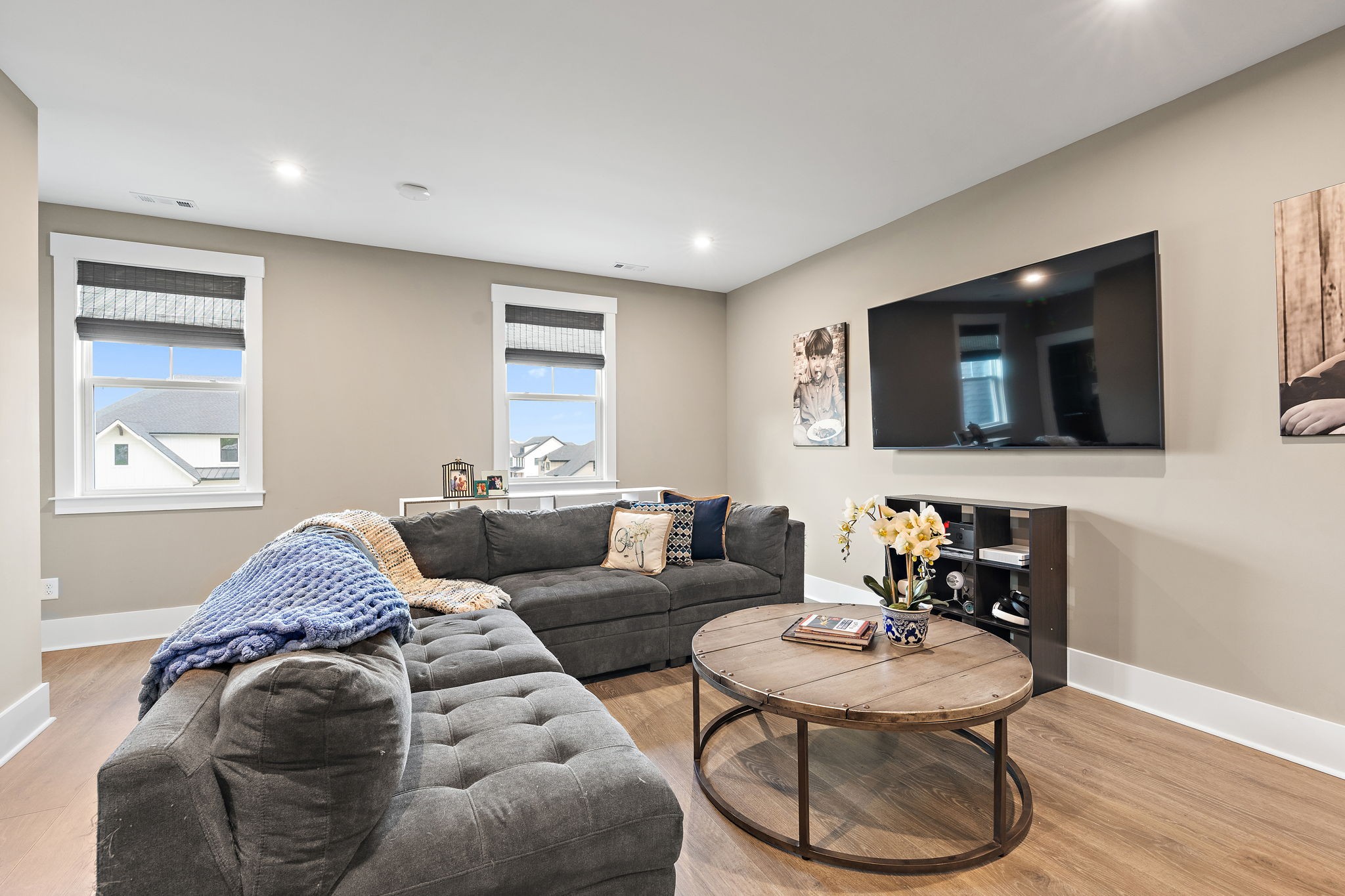 7276 Murrel Drive Franklin, TN 37064 - Photo 25 of 62 a living room with furniture and a flat screen tv