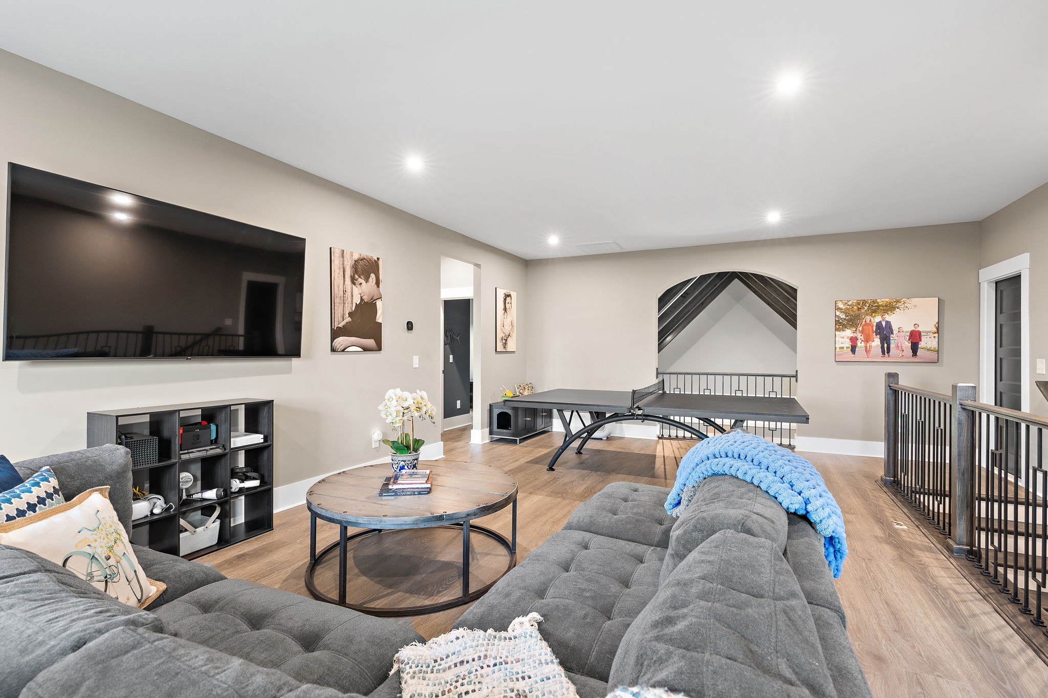 7276 Murrel Drive Franklin, TN 37064 - Photo 26 of 62 a living room with furniture and a flat screen tv