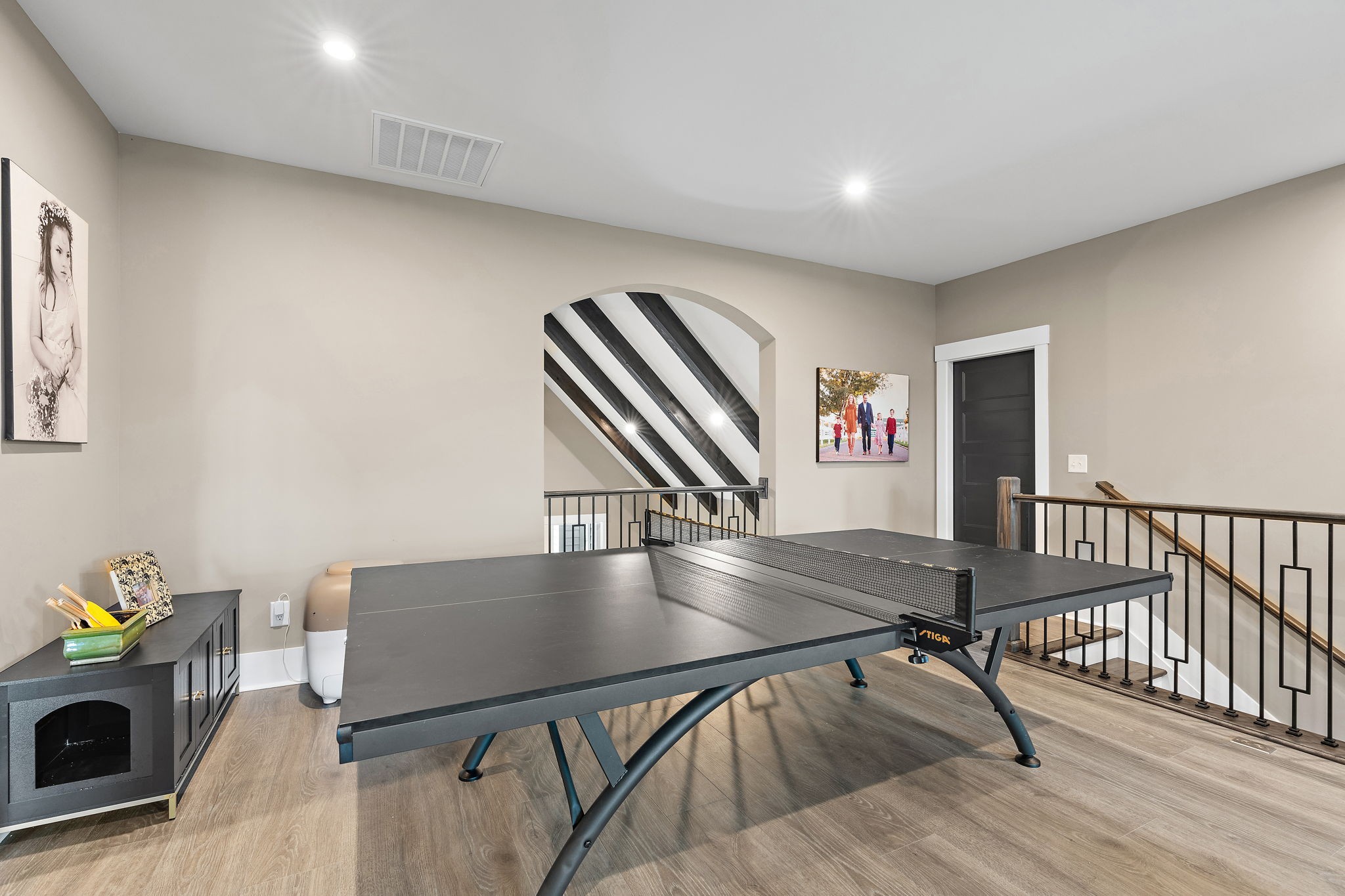 7276 Murrel Drive Franklin, TN 37064 - Photo 28 of 62 a view of livingroom and dining room with furniture wooden floor and a fireplace