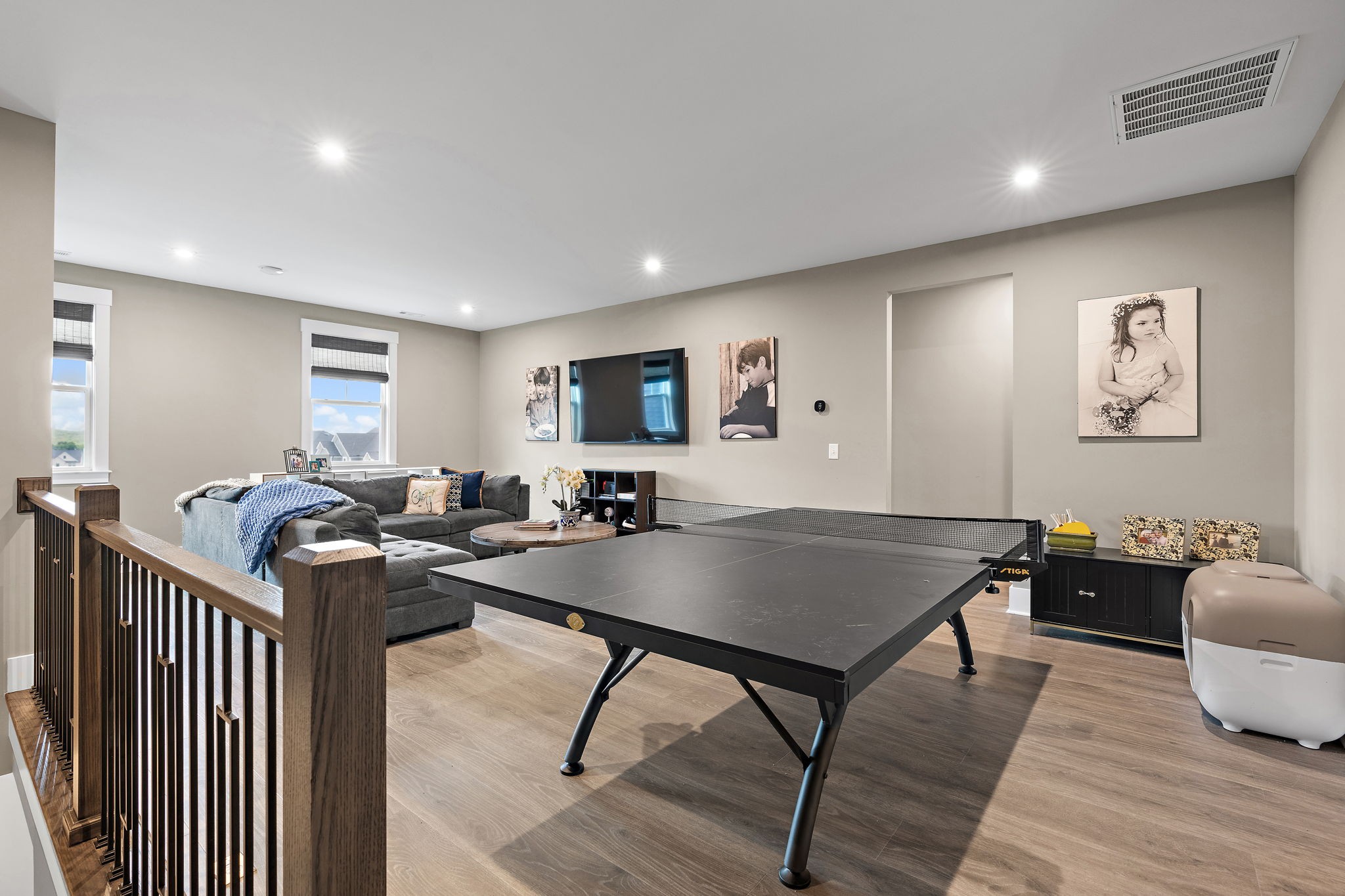 7276 Murrel Drive Franklin, TN 37064 - Photo 29 of 62 a living room with furniture a rug and a table