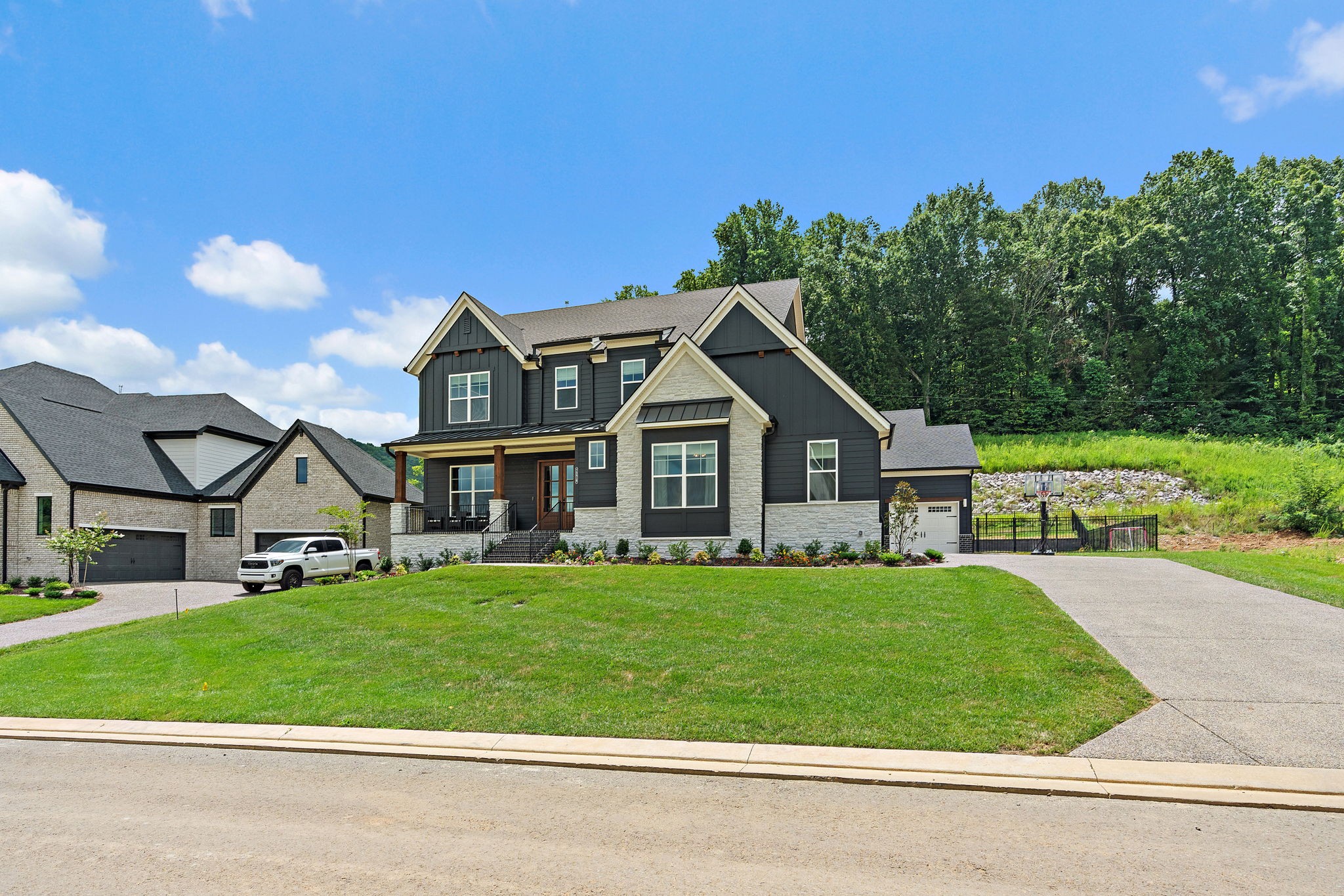 7276 Murrel Drive Franklin, TN 37064 - Photo 3 of 62 a front view of a house with a yard