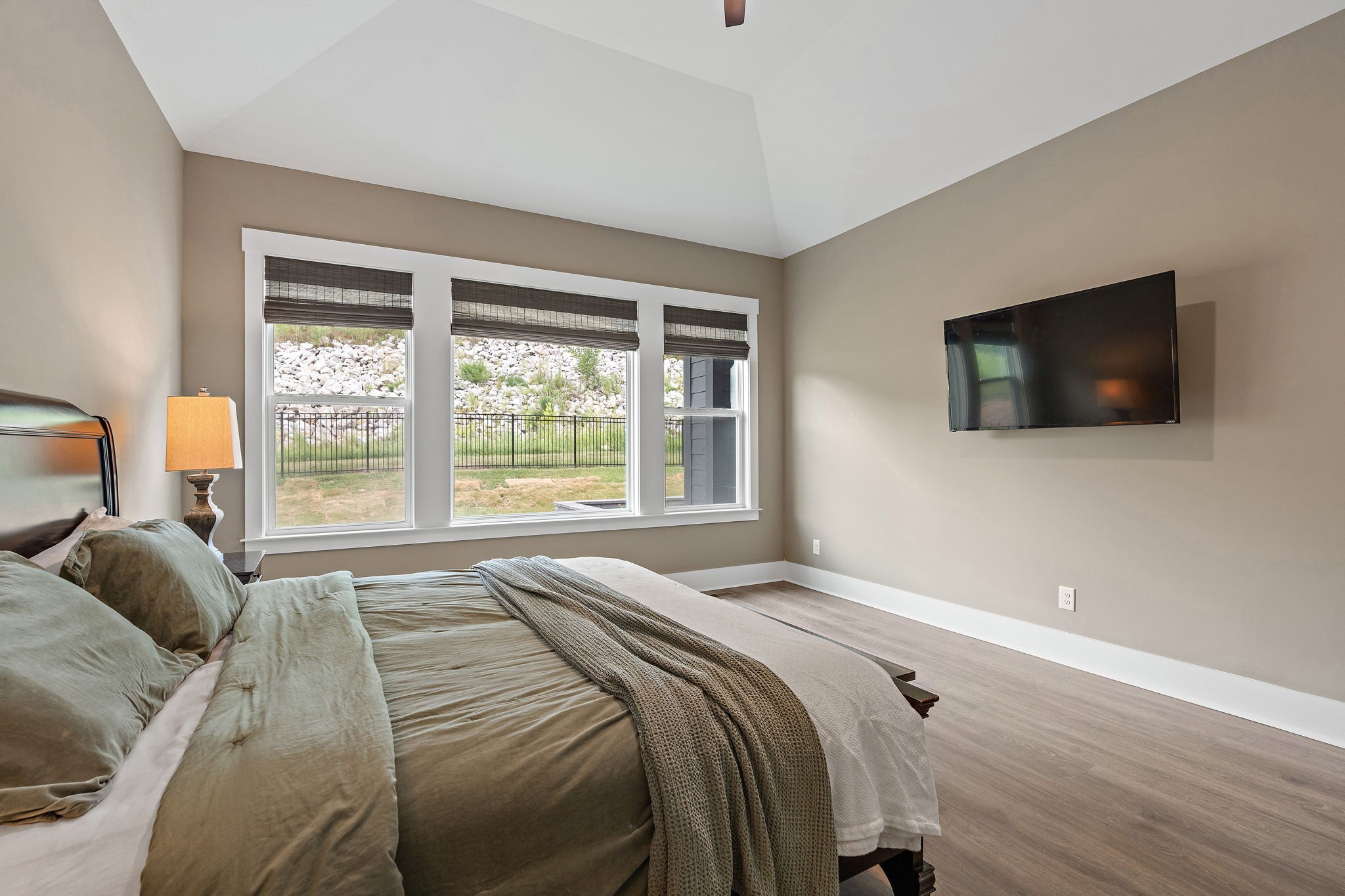 7276 Murrel Drive Franklin, TN 37064 - Photo 31 of 62 a bedroom with a bed and a flat screen tv