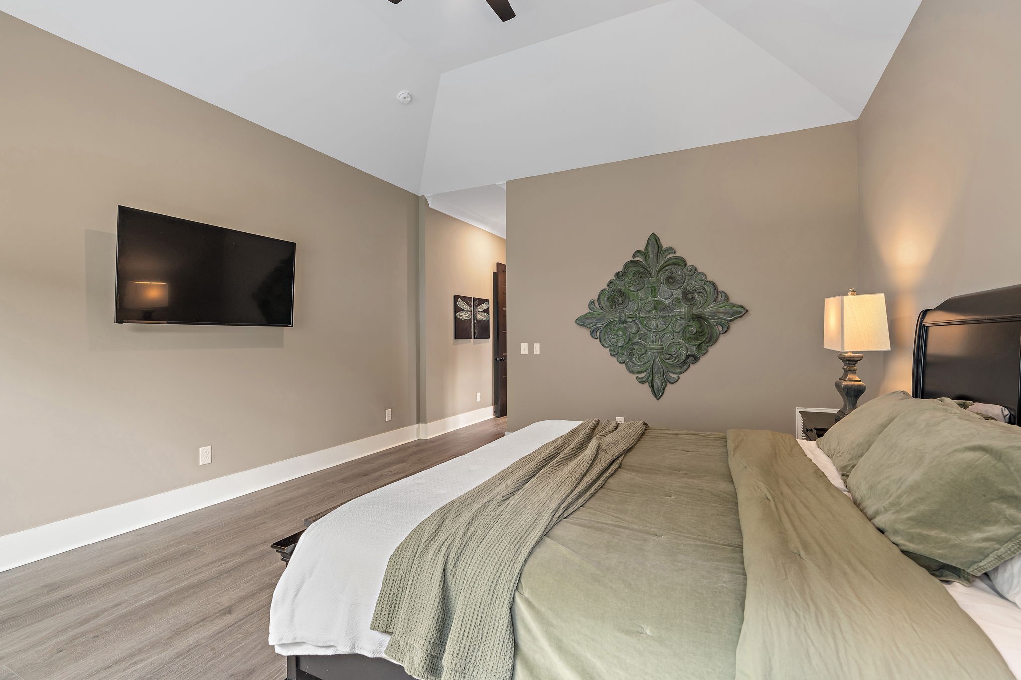 7276 Murrel Drive Franklin, TN 37064 - Photo 33 of 62 a bedroom with a bed and a flat screen tv