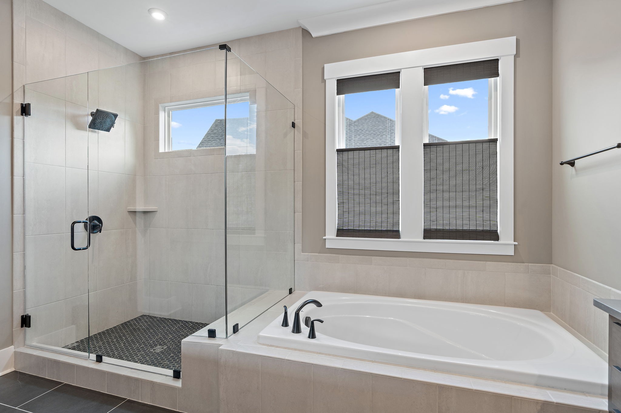 7276 Murrel Drive Franklin, TN 37064 - Photo 35 of 62 a bathroom with a bathtub and a shower