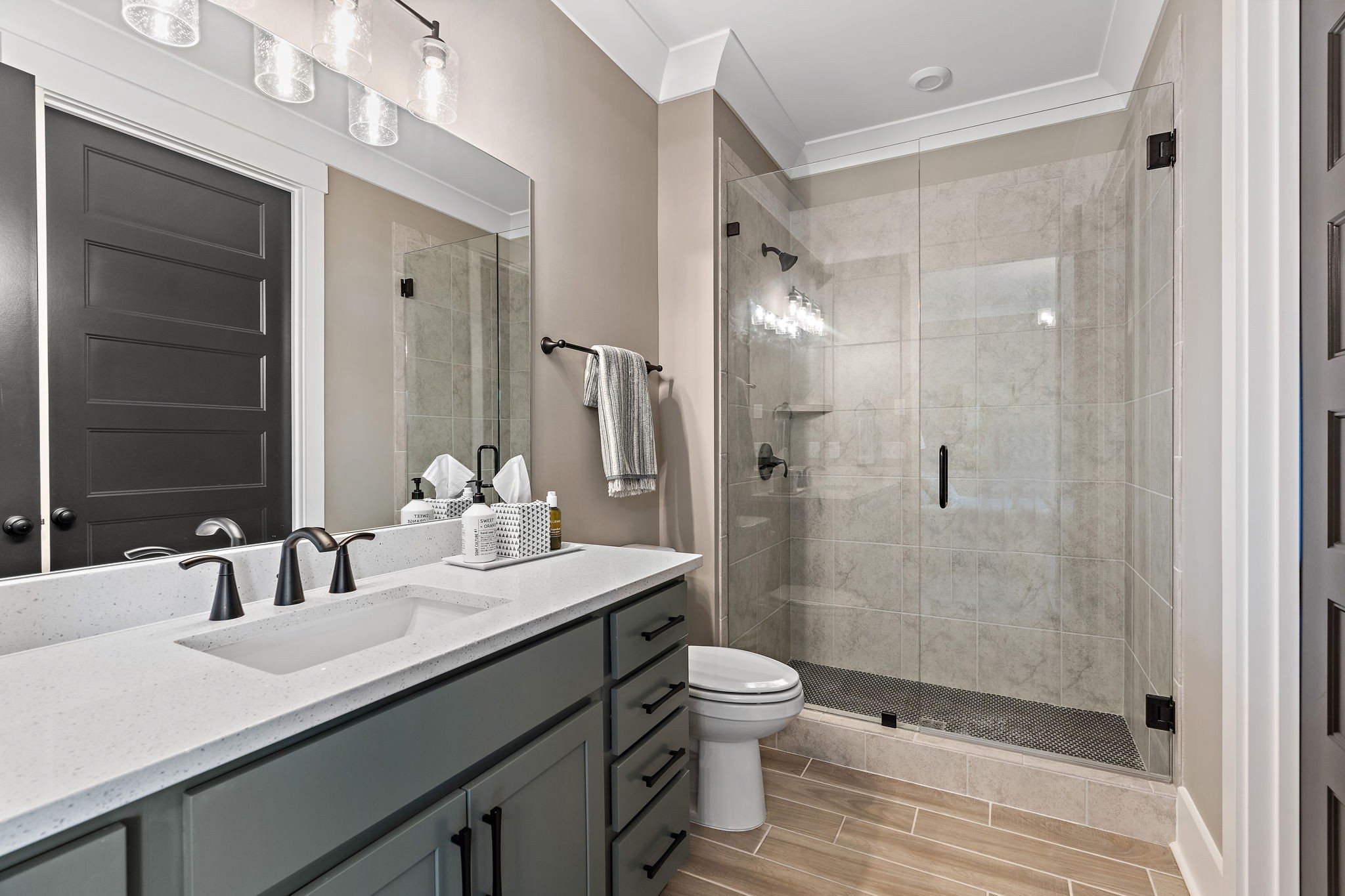 7276 Murrel Drive Franklin, TN 37064 - Photo 50 of 62 a bathroom with a double vanity sink toilet and shower
