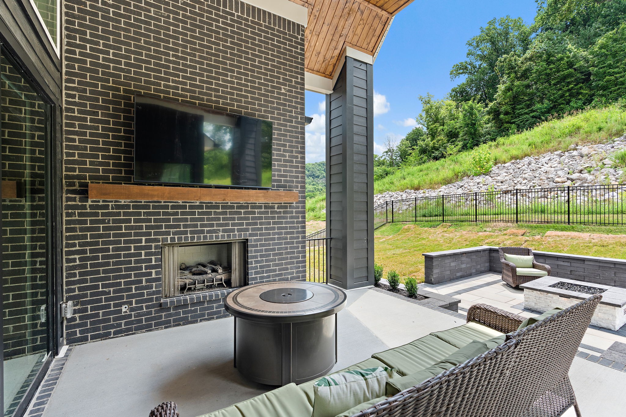 7276 Murrel Drive Franklin, TN 37064 - Photo 51 of 62 a view of a patio with couches chairs and a fire pit