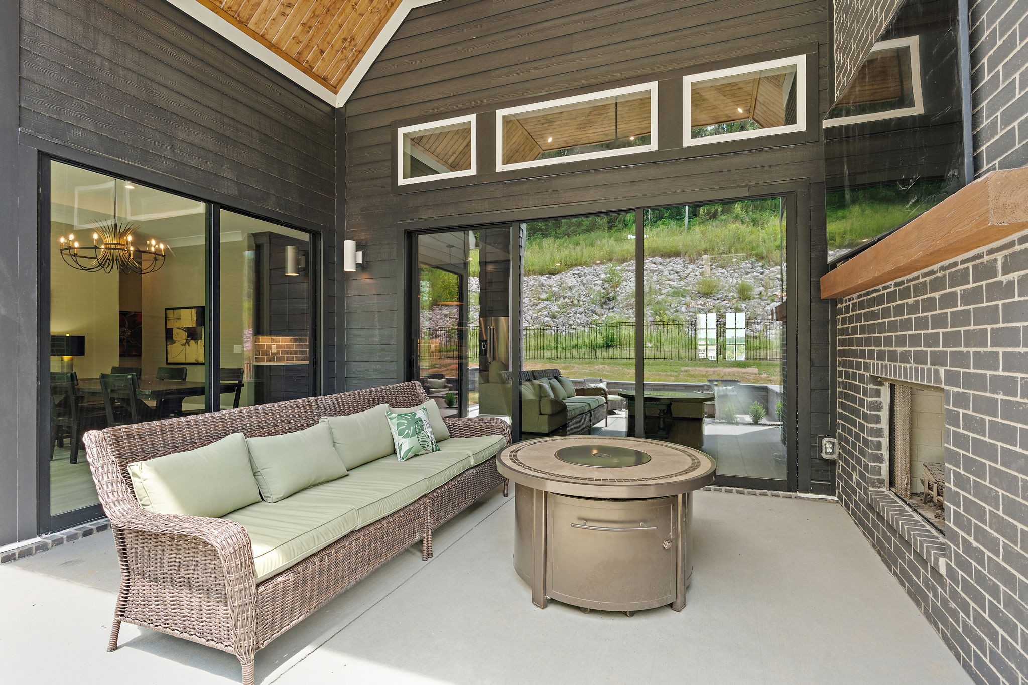 7276 Murrel Drive Franklin, TN 37064 - Photo 54 of 62 a view of a patio with couches chairs and a fire pit