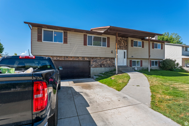 2475 West 200 North Provo, UT 84601 - Photo 3 of 16 Split-level residence featuring light-toned siding and a stone facade