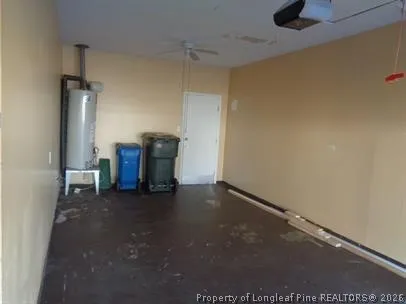a view of a storage & utility room with a sink