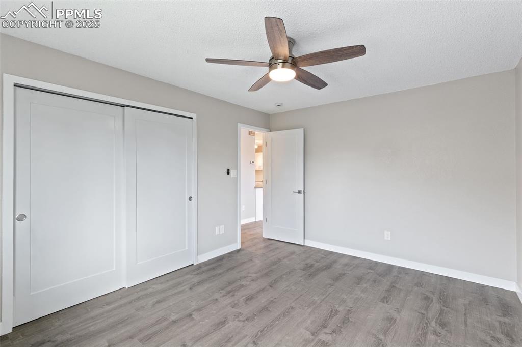 4435 Hunting Meadows Circle Colorado Springs, CO 80916 - Photo 13 of 15 Bedroom with ceiling fan