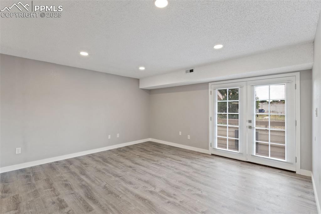 4435 Hunting Meadows Circle Colorado Springs, CO 80916 - Photo 3 of 15 Living Room toward front door