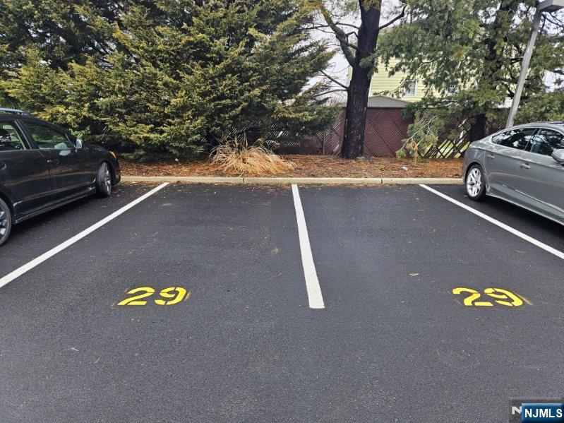 58 Main Street, Unit 29 Little Ferry, NJ 07643 - Photo 3 of 5 a view of outdoor space with swimming pool