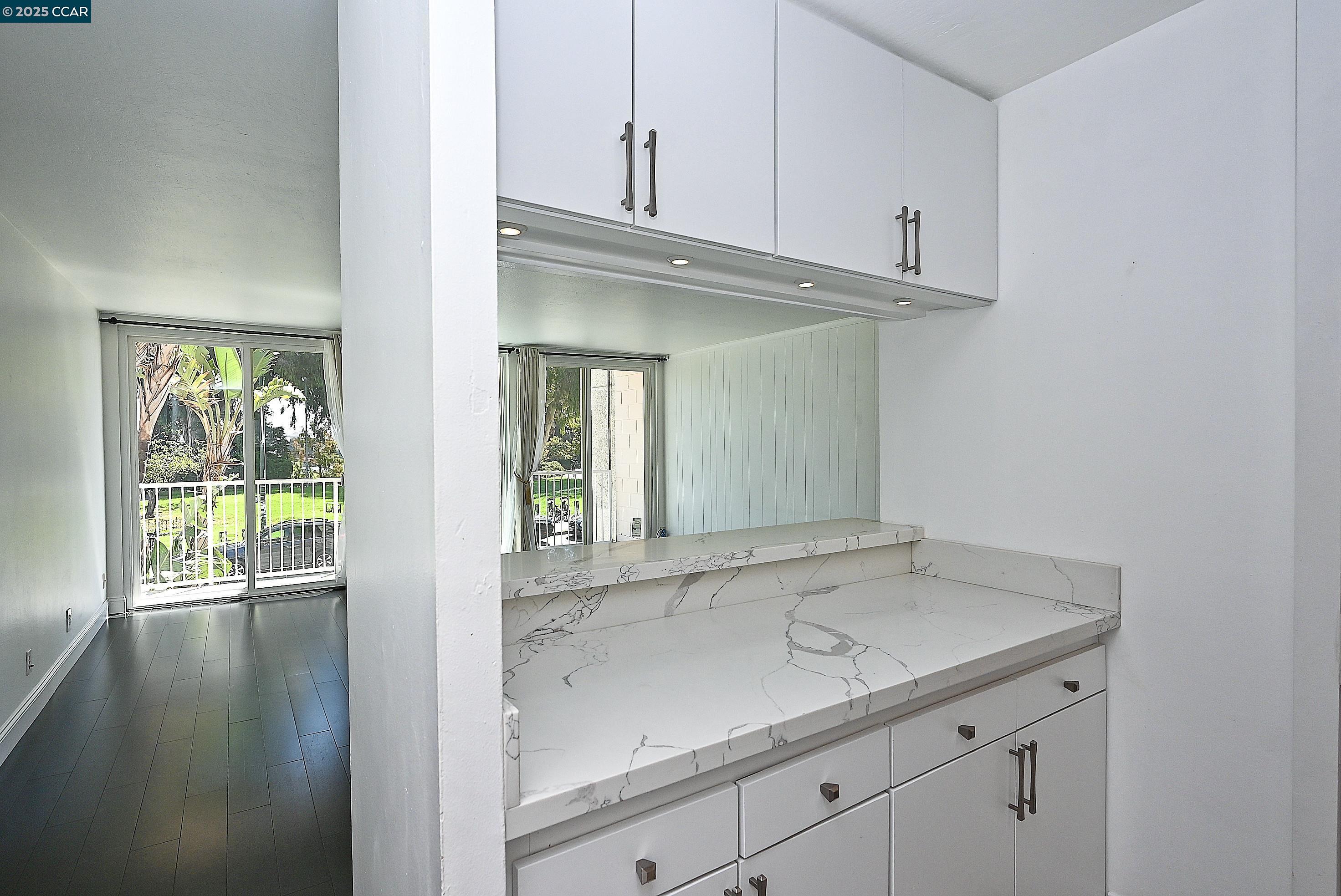 1425 Lakeside Drive, Unit 101 Oakland, CA 94612 - Photo 14 of 36 a bathroom with a sink and a window