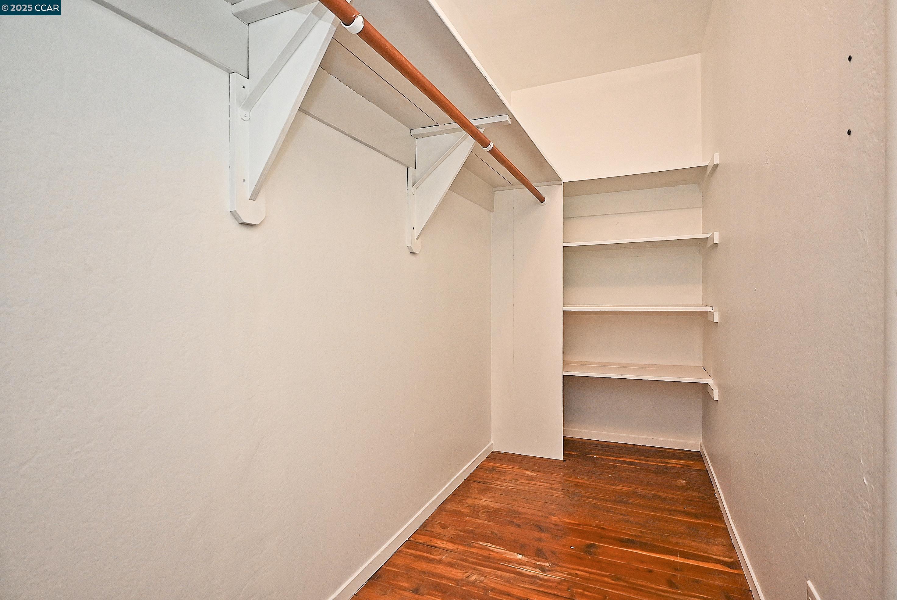 1425 Lakeside Drive, Unit 101 Oakland, CA 94612 - Photo 21 of 36 a view of a room with rack on the wall