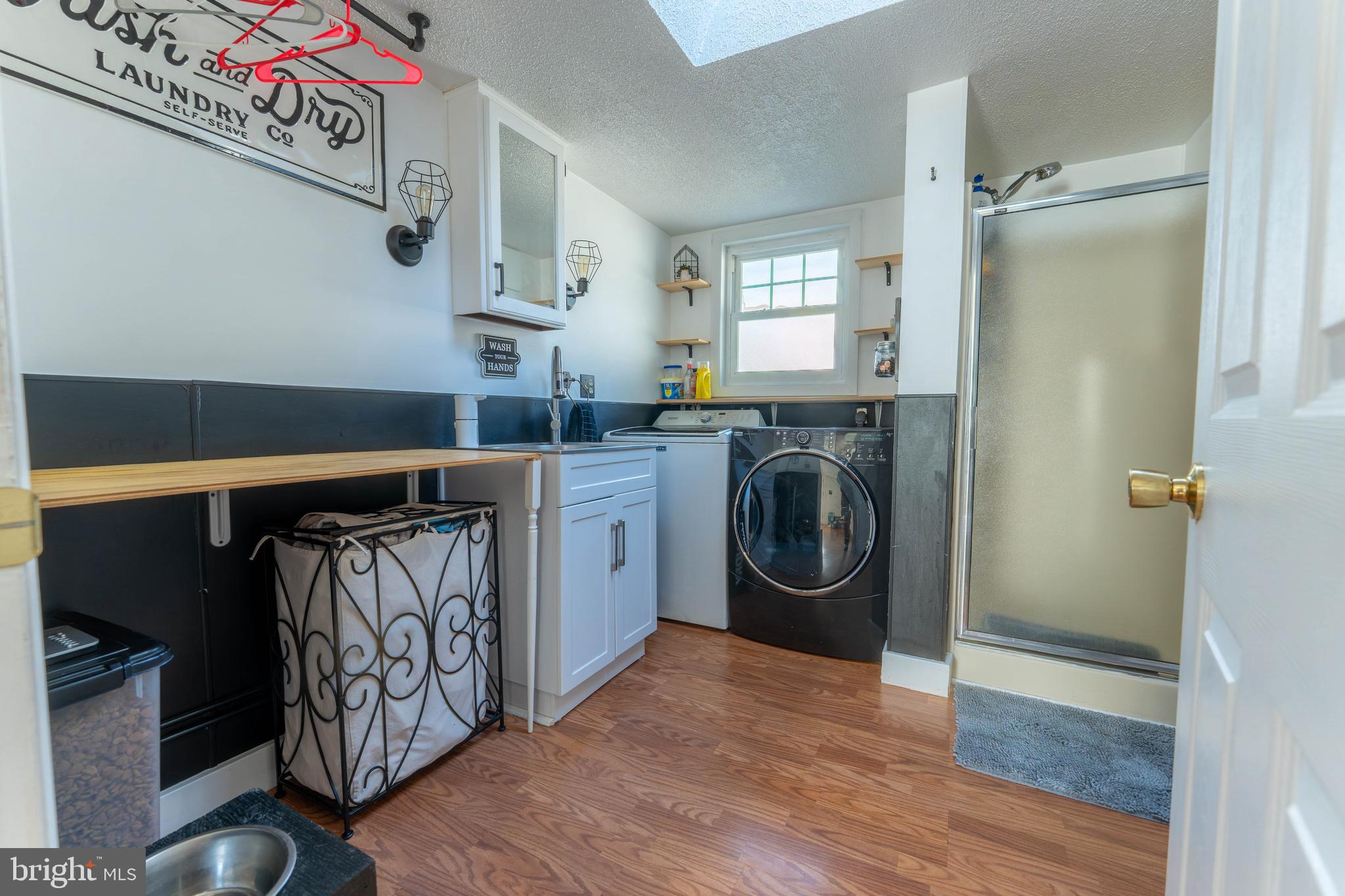 16 Main Street Felton, PA 17322 - Photo 14 of 34 a view of a hallway with washer and dryer