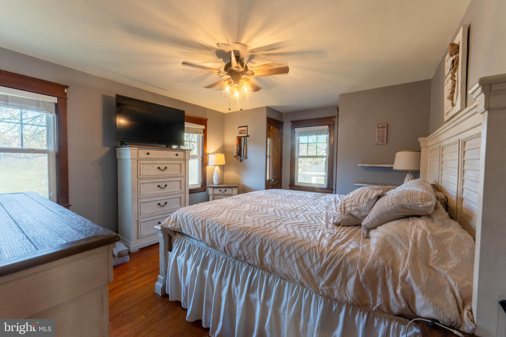 16 Main Street Felton, PA 17322 - Photo 16 of 34 a bedroom with a bed and a flat screen tv