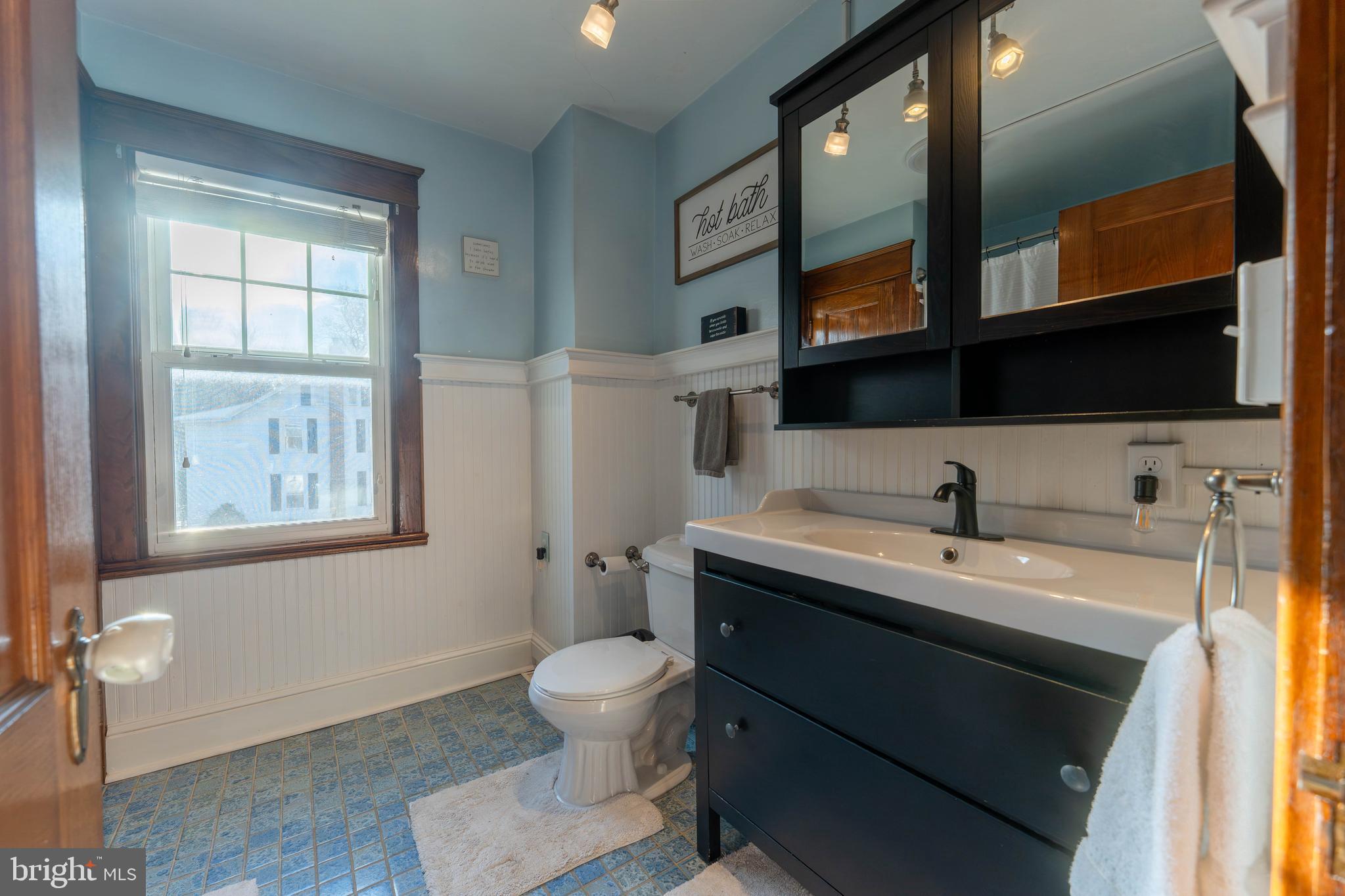 16 Main Street Felton, PA 17322 - Photo 19 of 34 a bathroom with a toilet sink and mirror