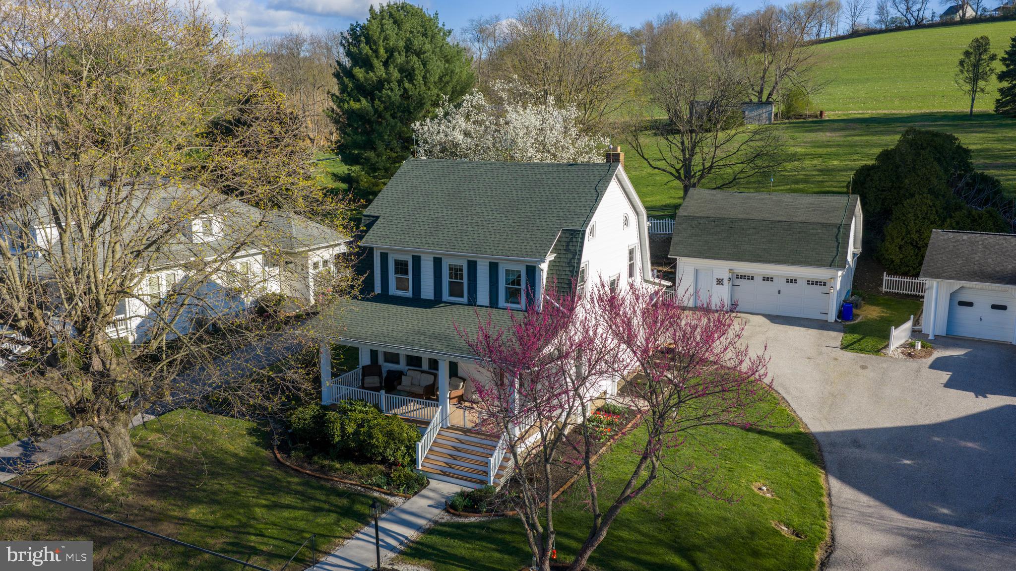 16 Main Street Felton, PA 17322 - Photo 2 of 34 a aerial view of a house with a yard and potted plants