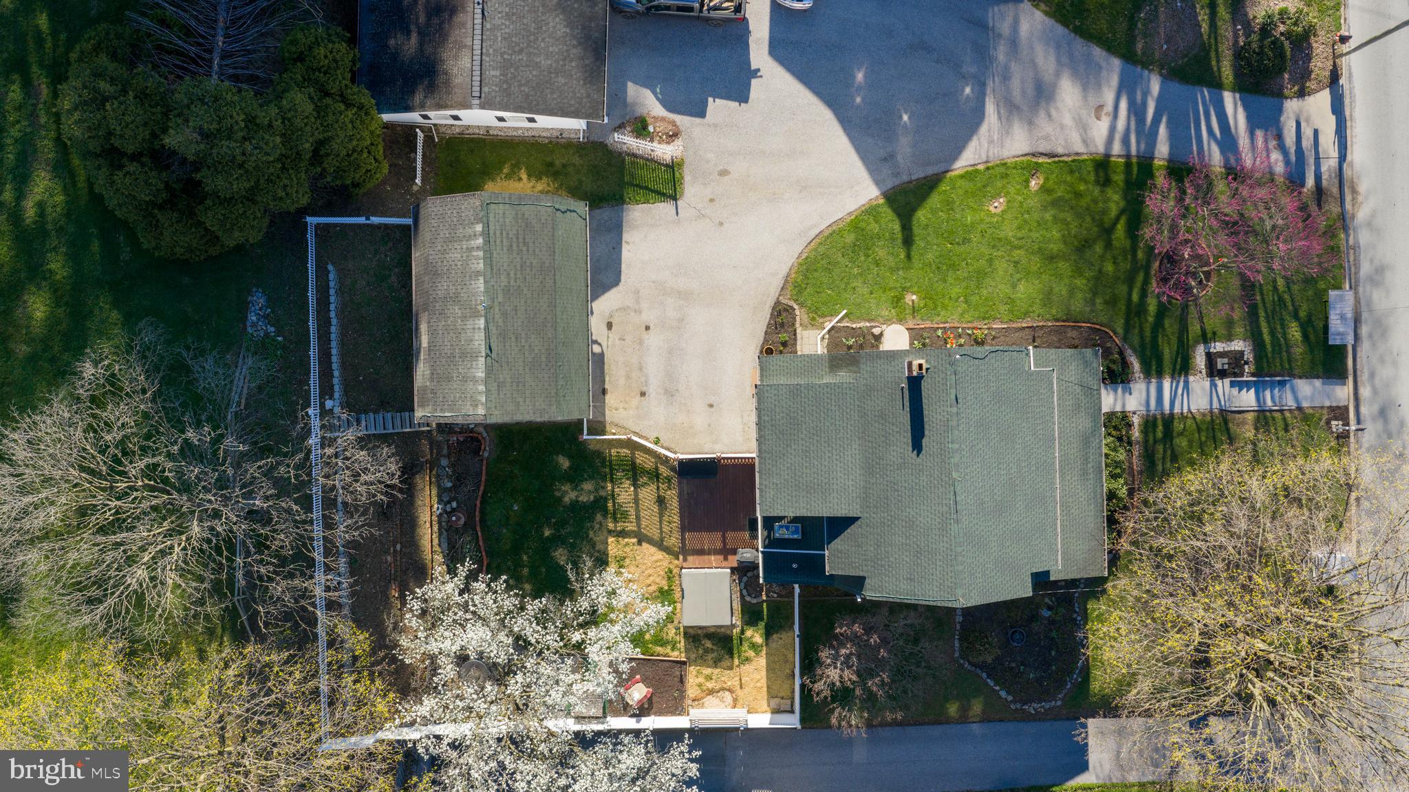 16 Main Street Felton, PA 17322 - Photo 30 of 34 an aerial view of a house with a yard basket ball court and outdoor seating