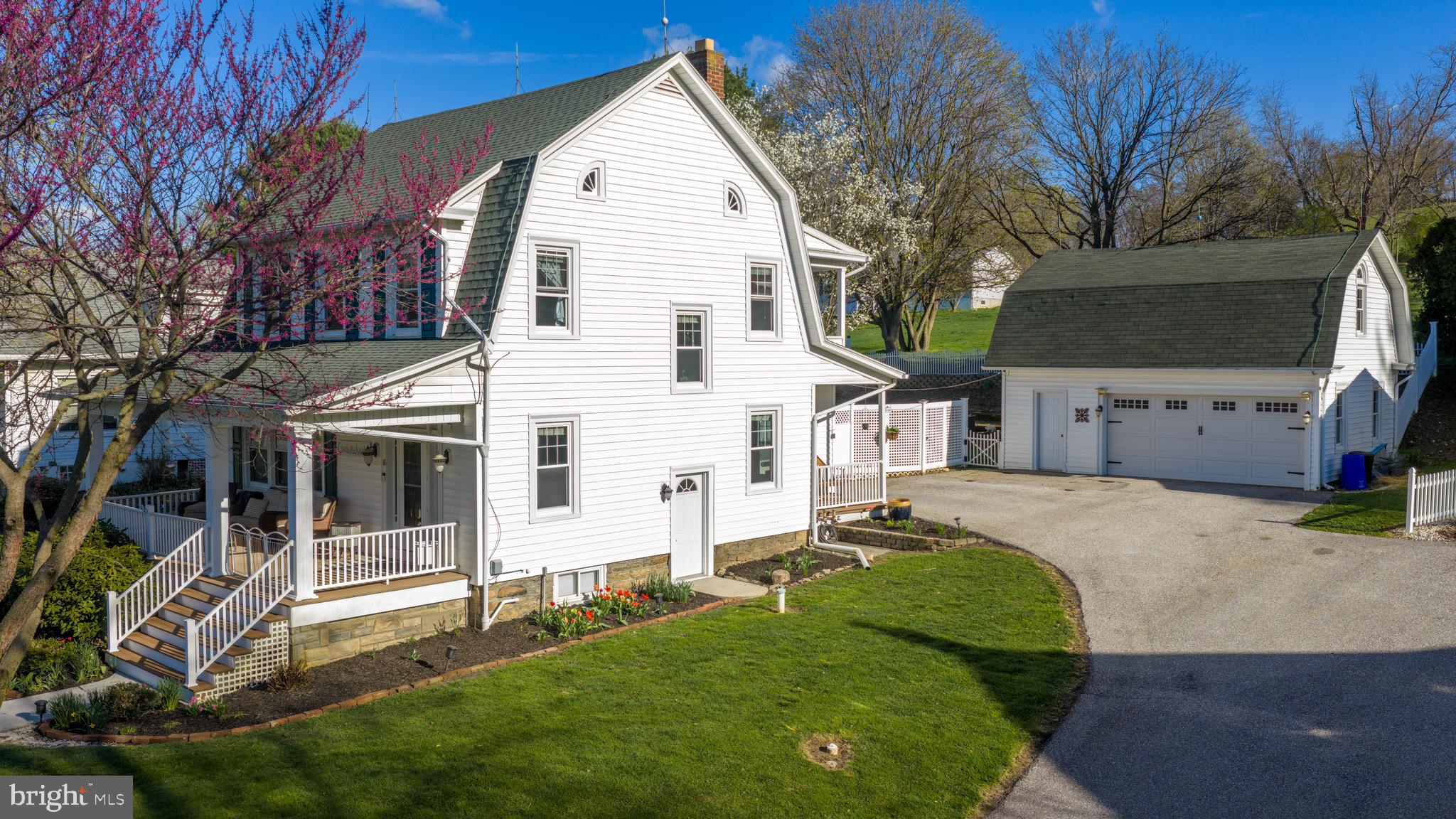 16 Main Street Felton, PA 17322 - Photo 34 of 34 a view of a white house with a big yard and large tree